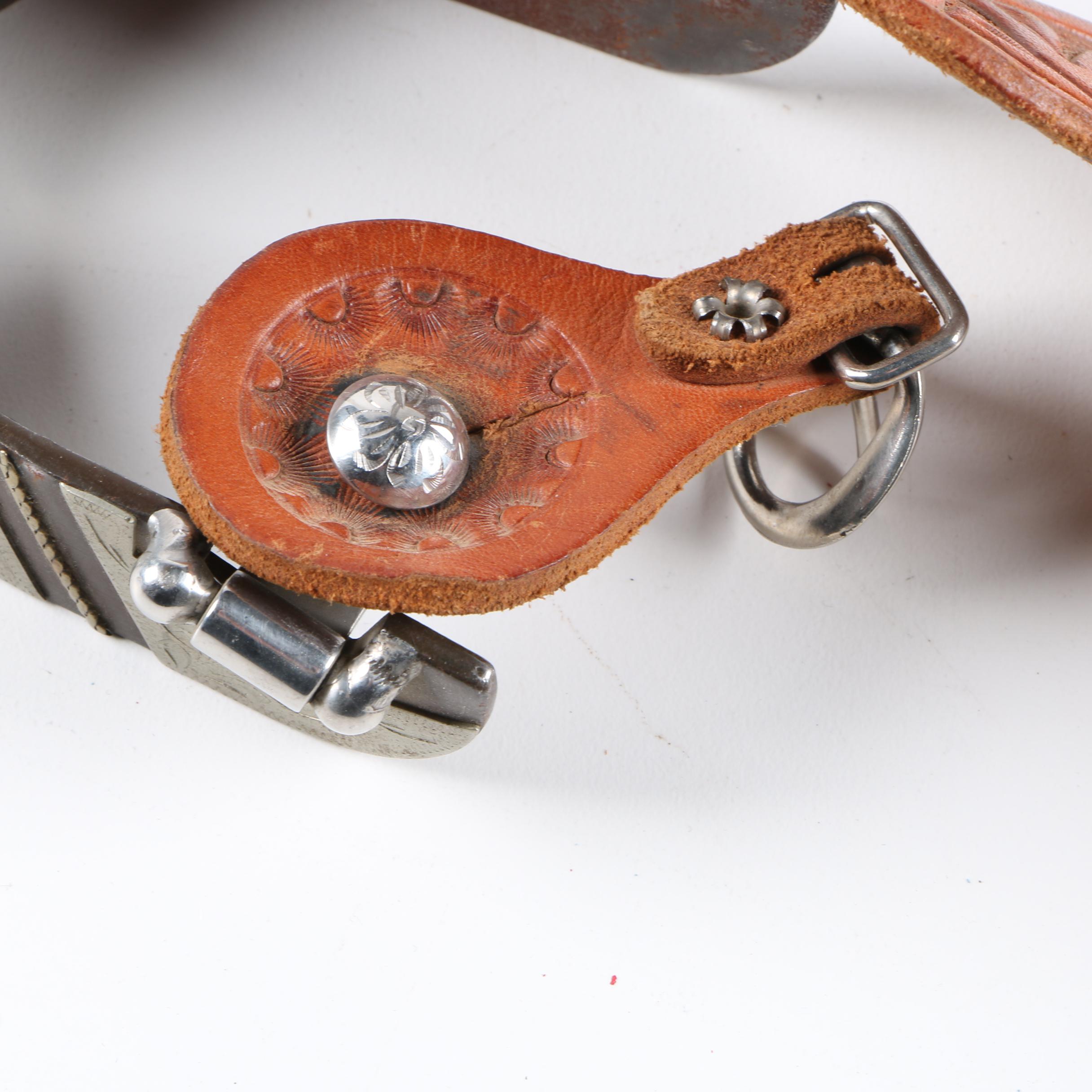 Pair of Spurs with Tooled Leather Straps