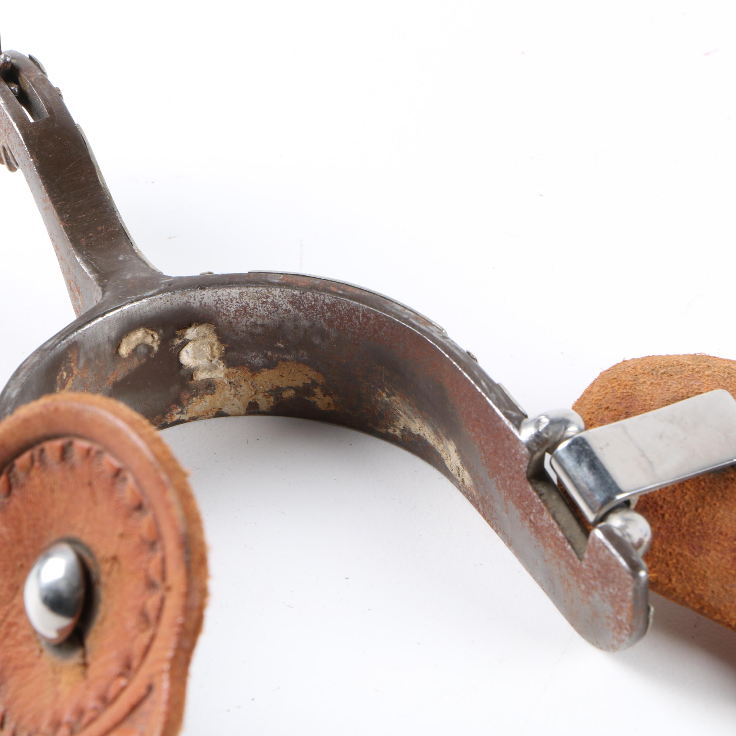 Pair of Spurs with Tooled Leather Straps