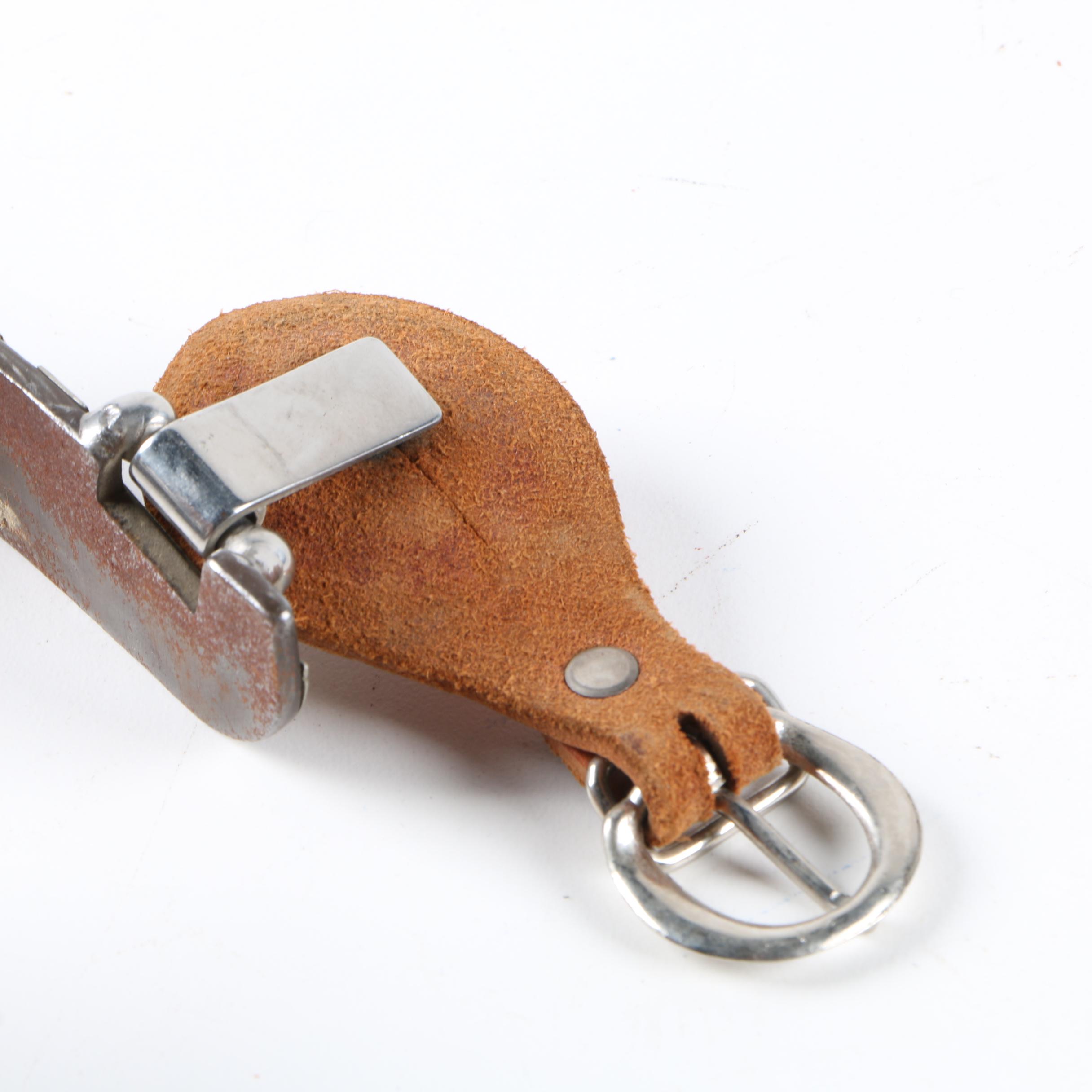 Pair of Spurs with Tooled Leather Straps