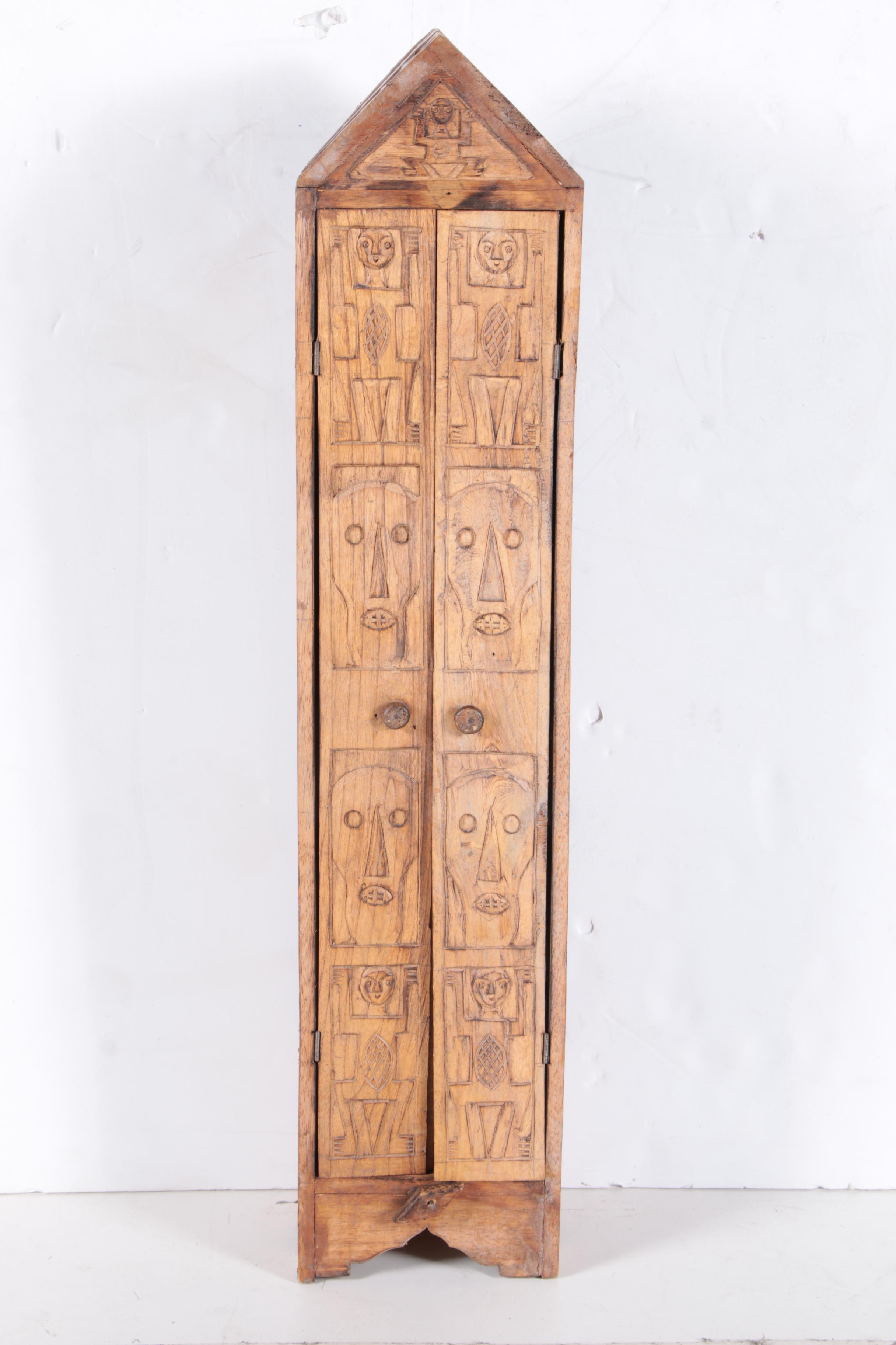 Carved Walnut Cabinet and Two Arrows