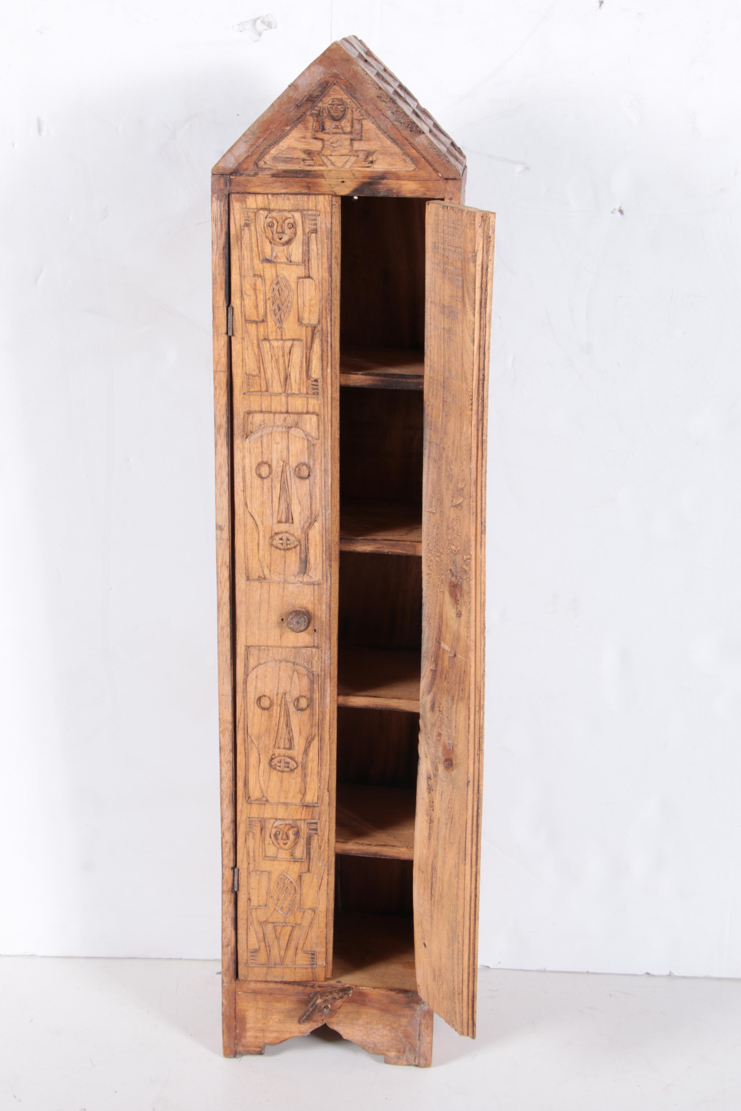 Carved Walnut Cabinet and Two Arrows