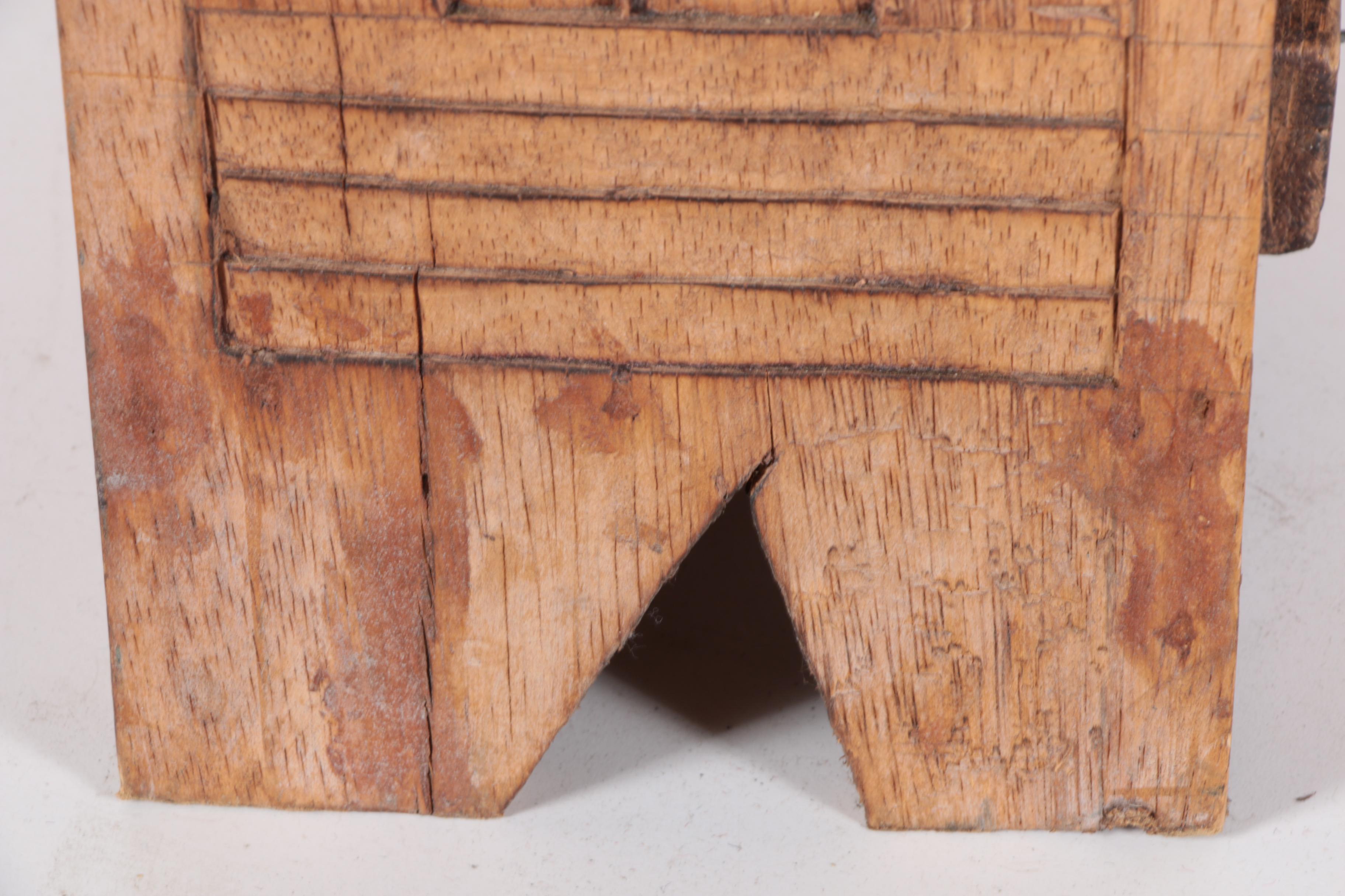 Carved Walnut Cabinet and Two Arrows