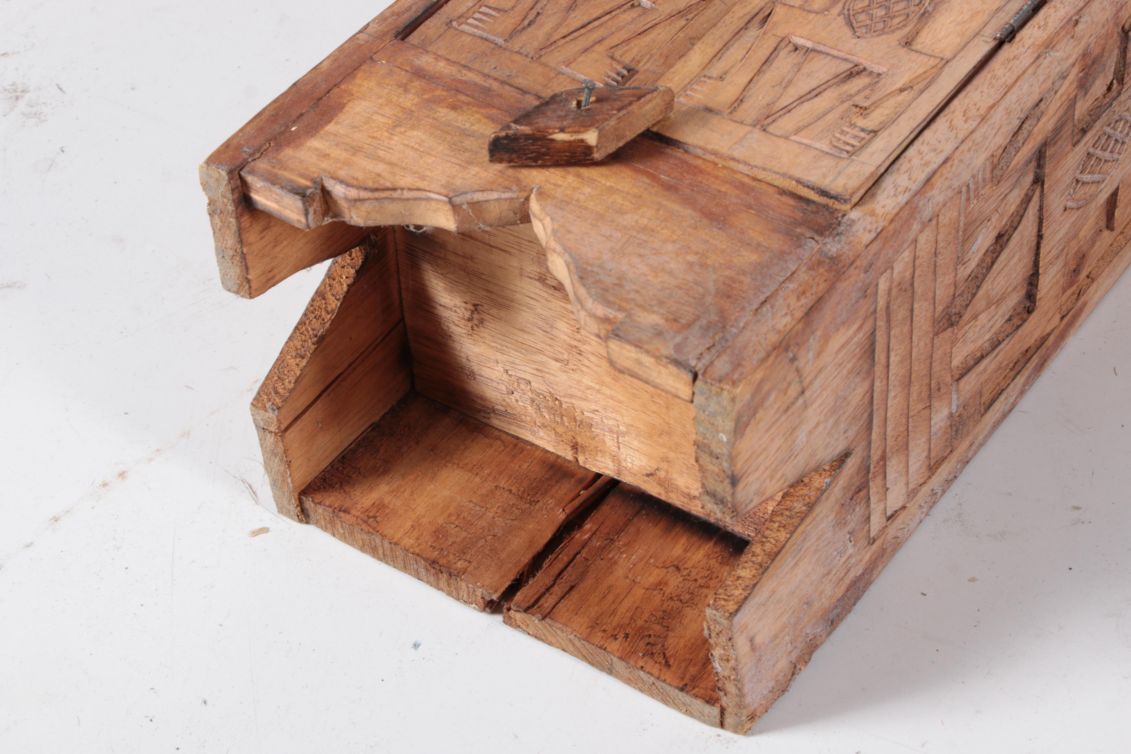 Carved Walnut Cabinet and Two Arrows