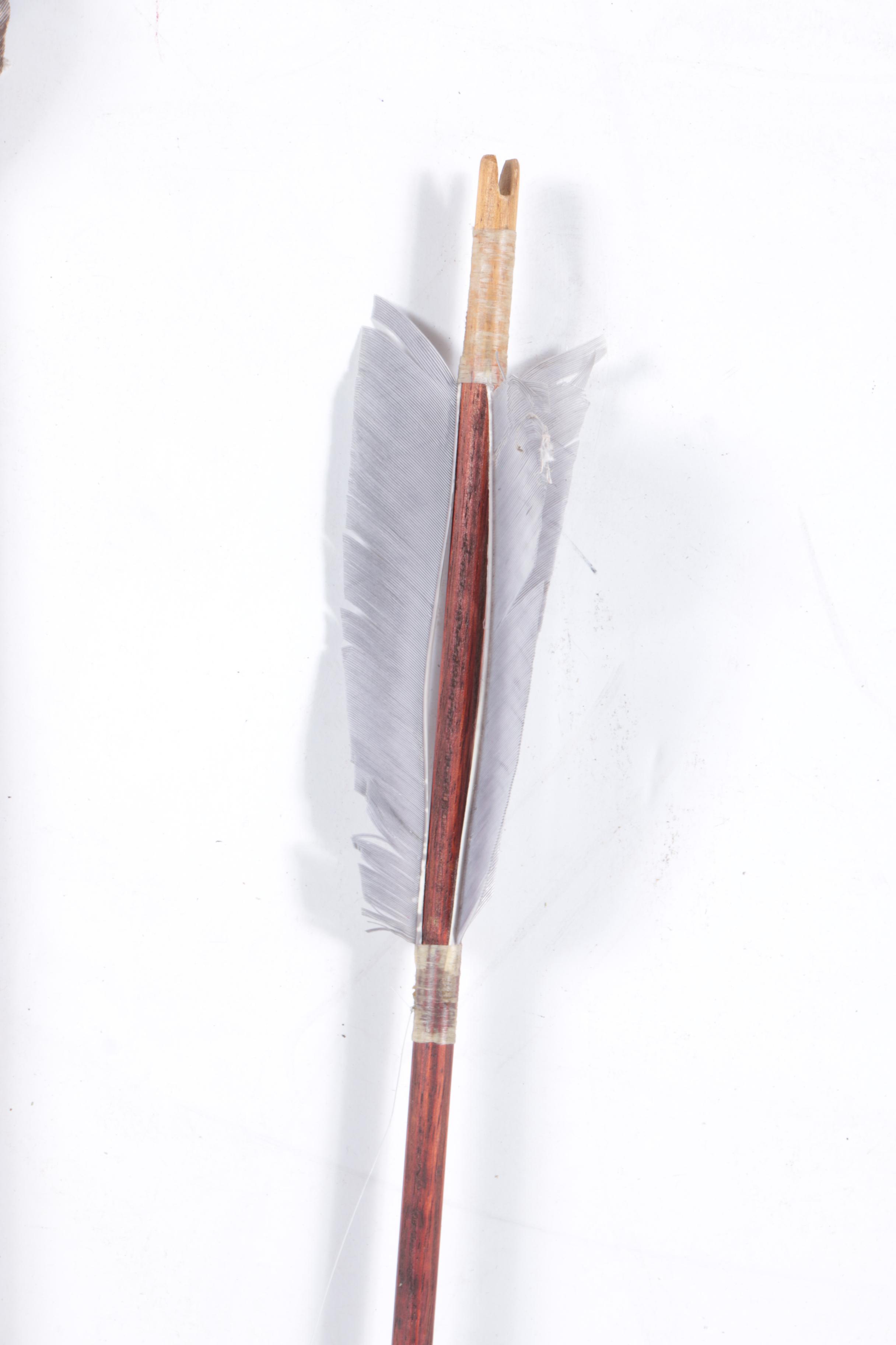 Carved Walnut Cabinet and Two Arrows