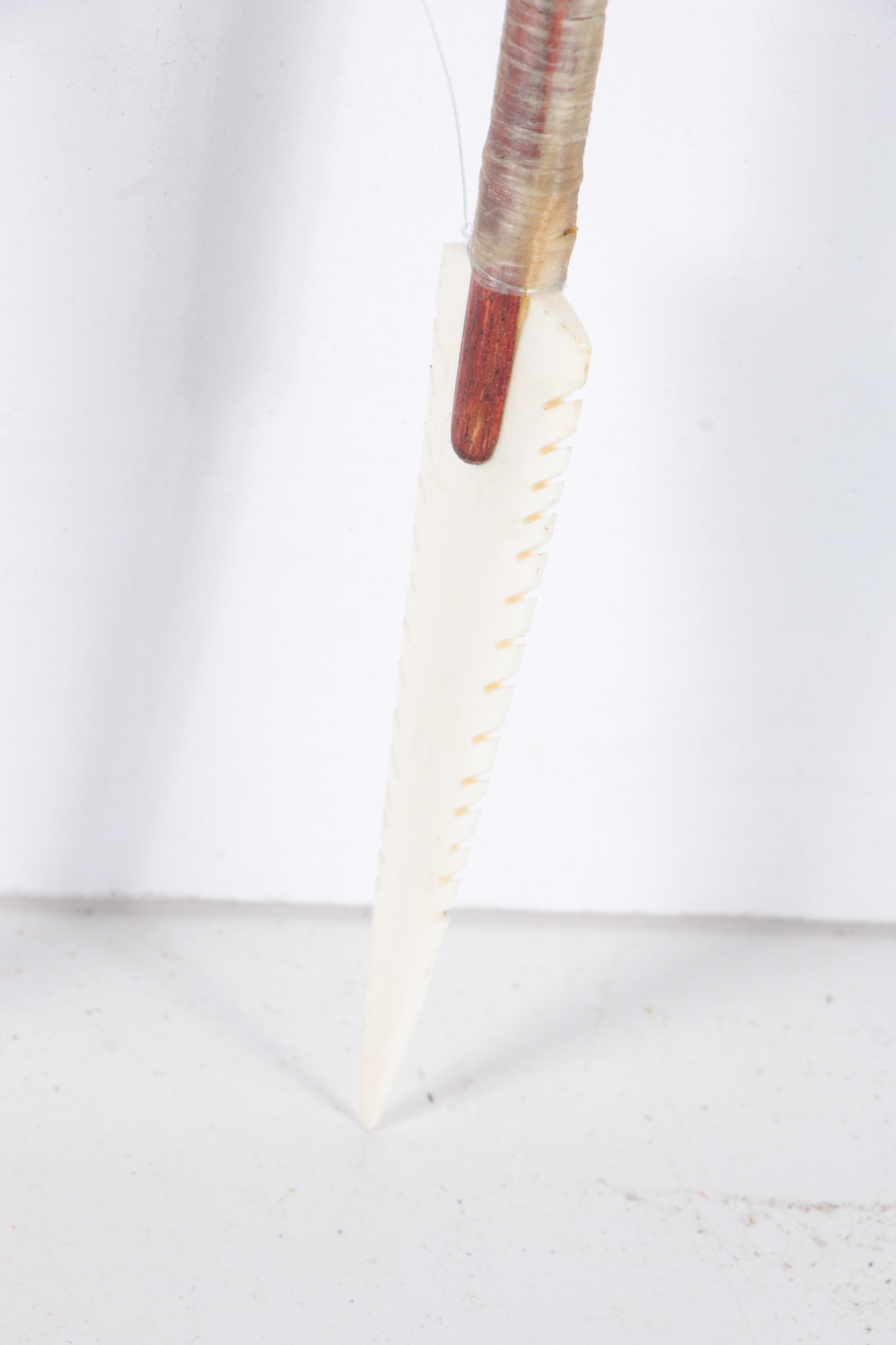 Carved Walnut Cabinet and Two Arrows