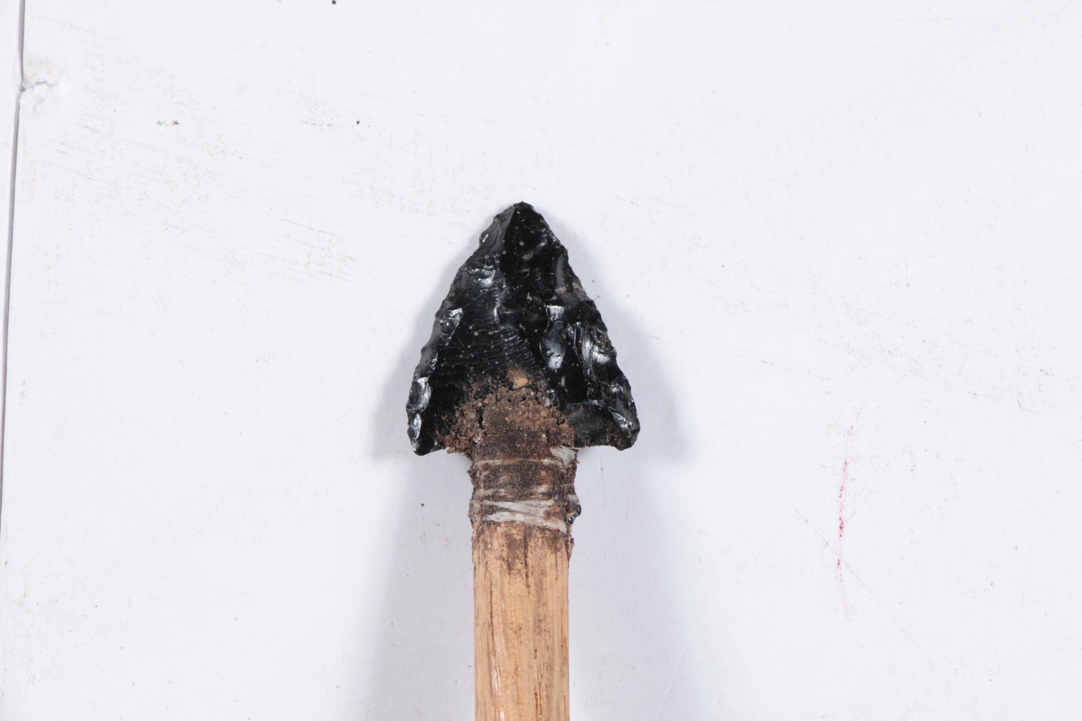 Carved Walnut Cabinet and Two Arrows