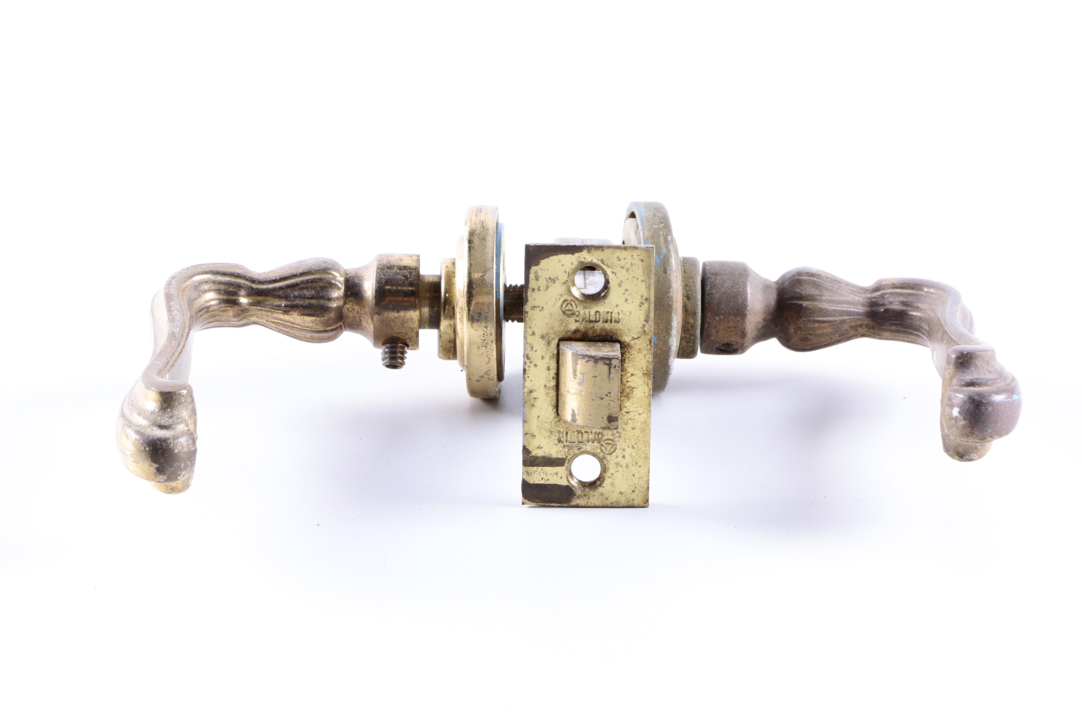 An Assortment of Door Knobs, Handles, and Mechanisms