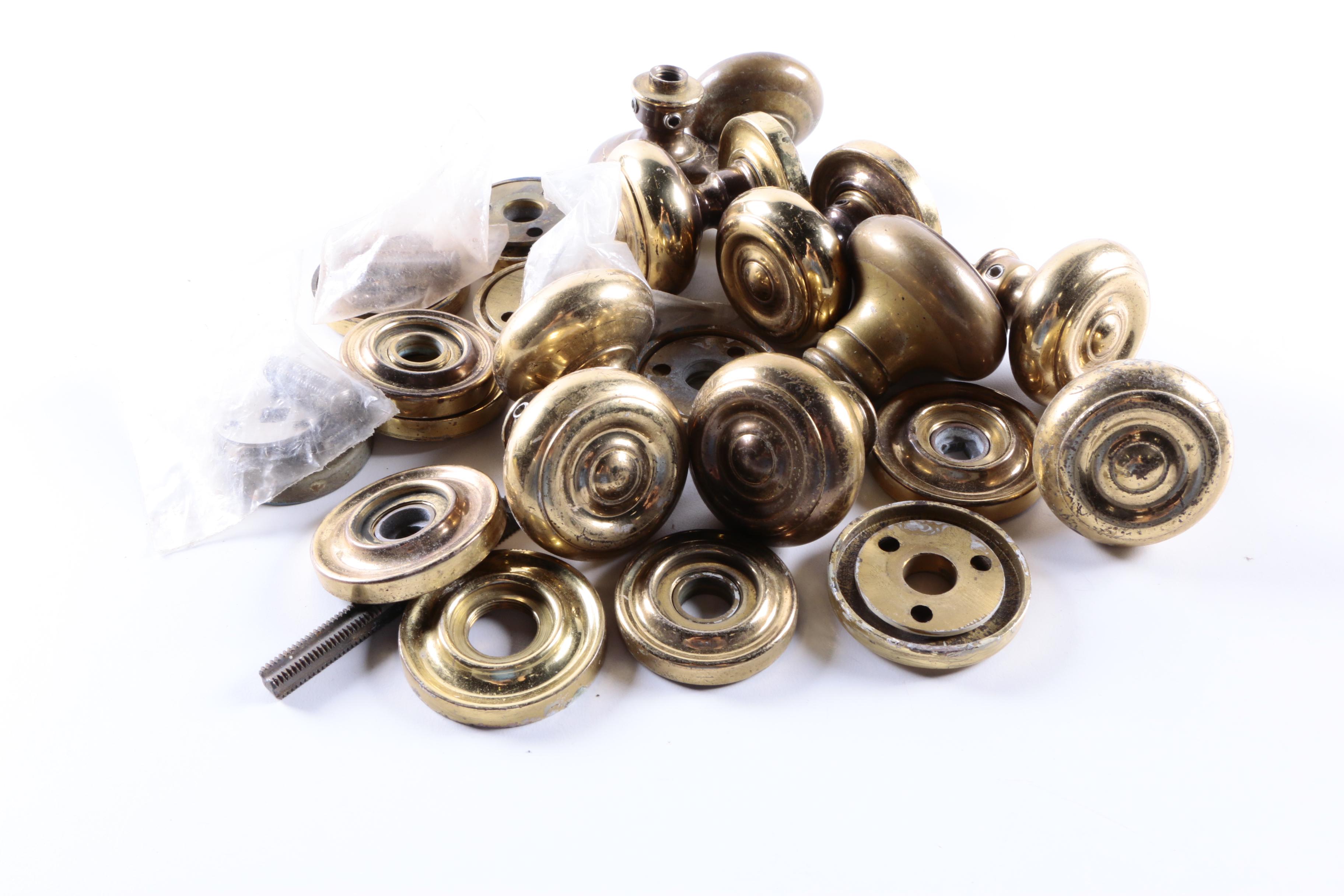An Assortment of Door Knobs, Handles, and Mechanisms