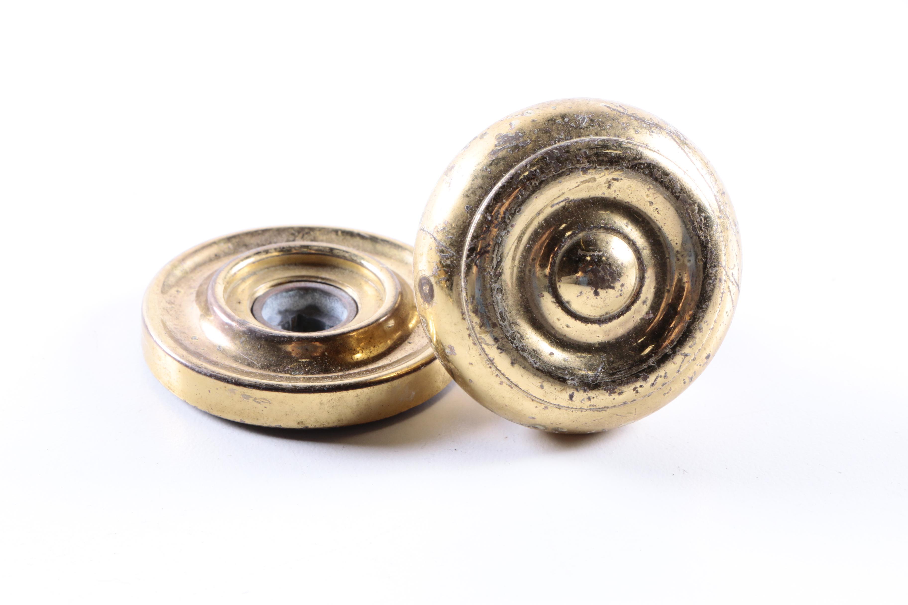 An Assortment of Door Knobs, Handles, and Mechanisms