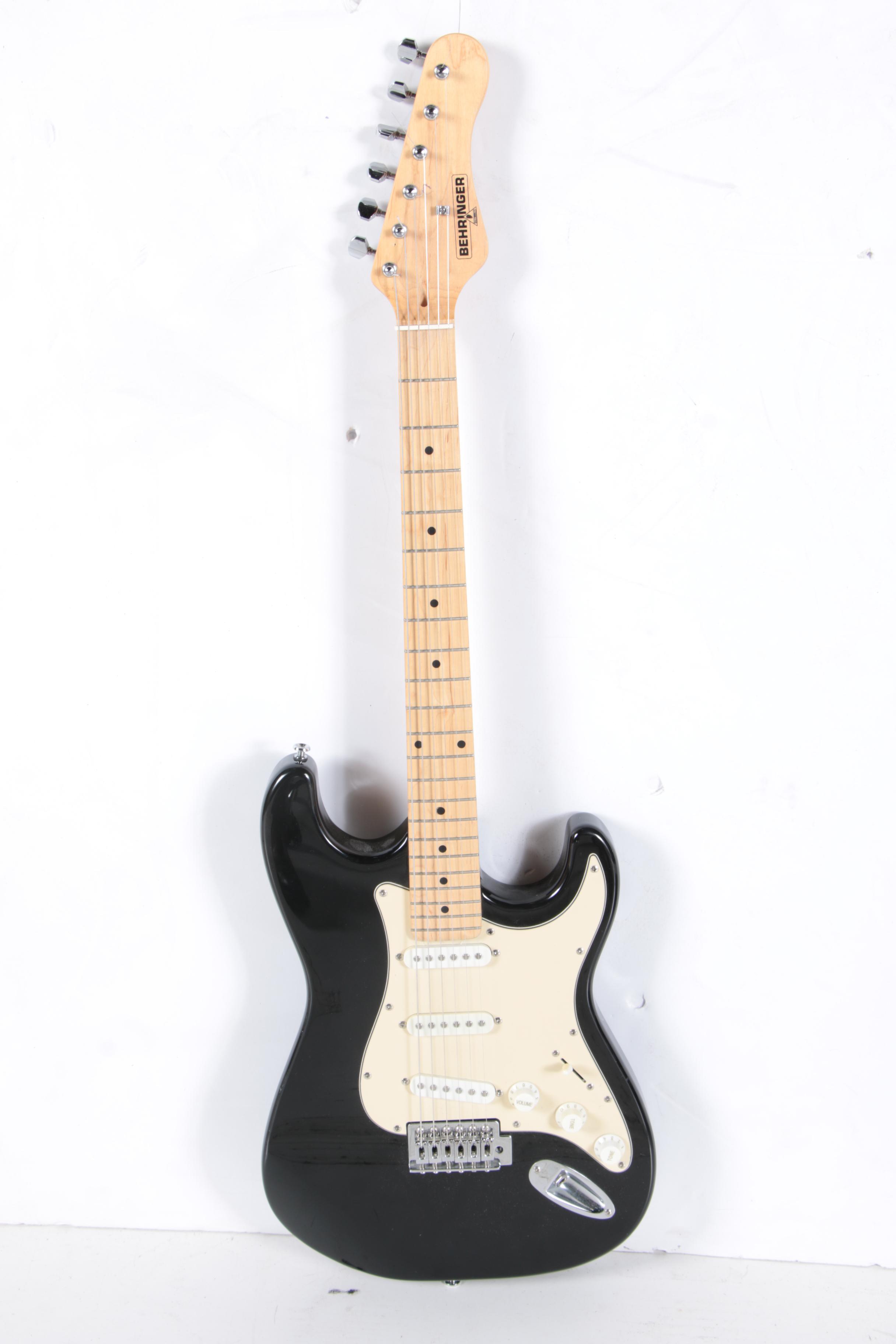 Behringer Strat Style Electric Guitar and Optimus Amplifier