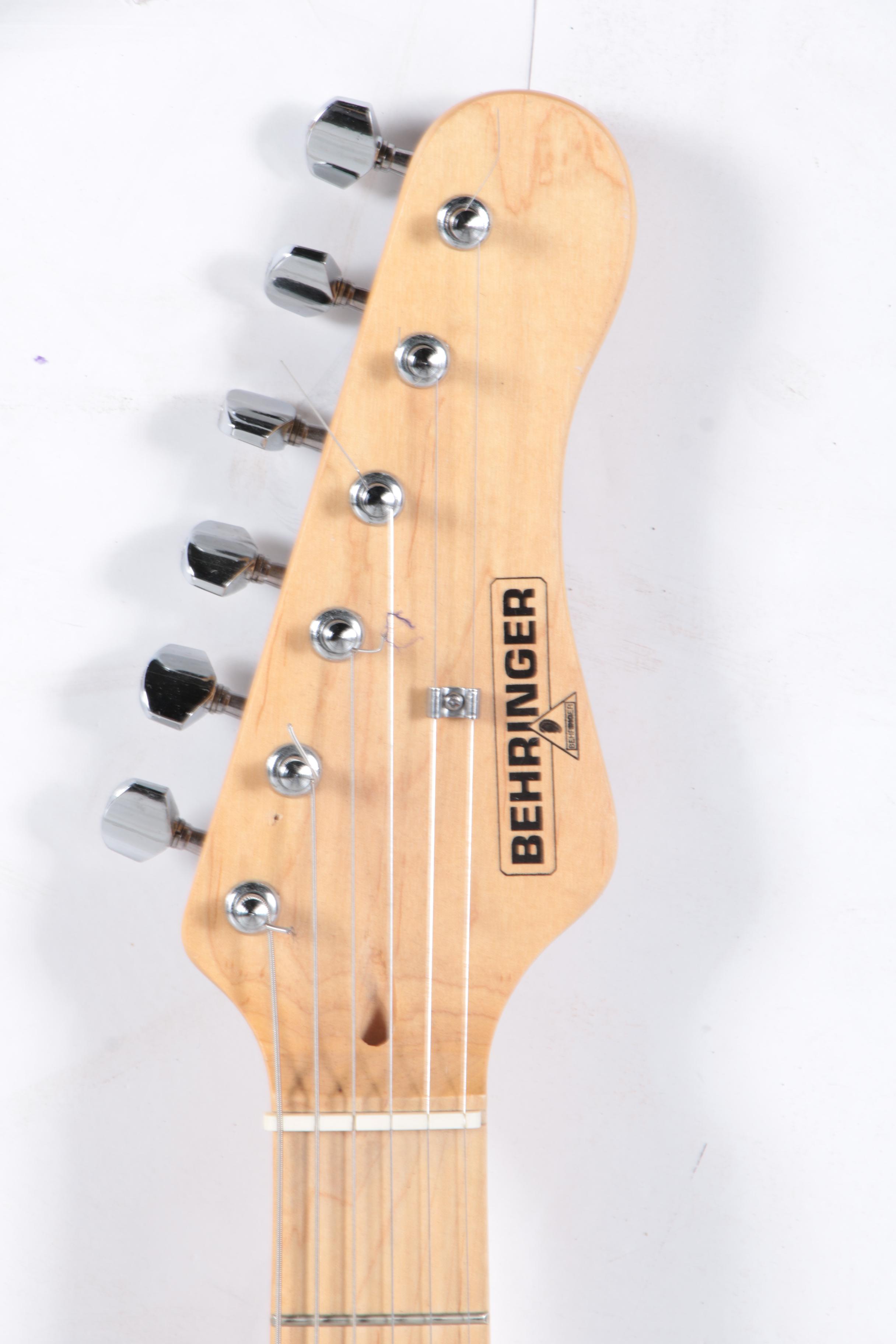 Behringer Strat Style Electric Guitar and Optimus Amplifier