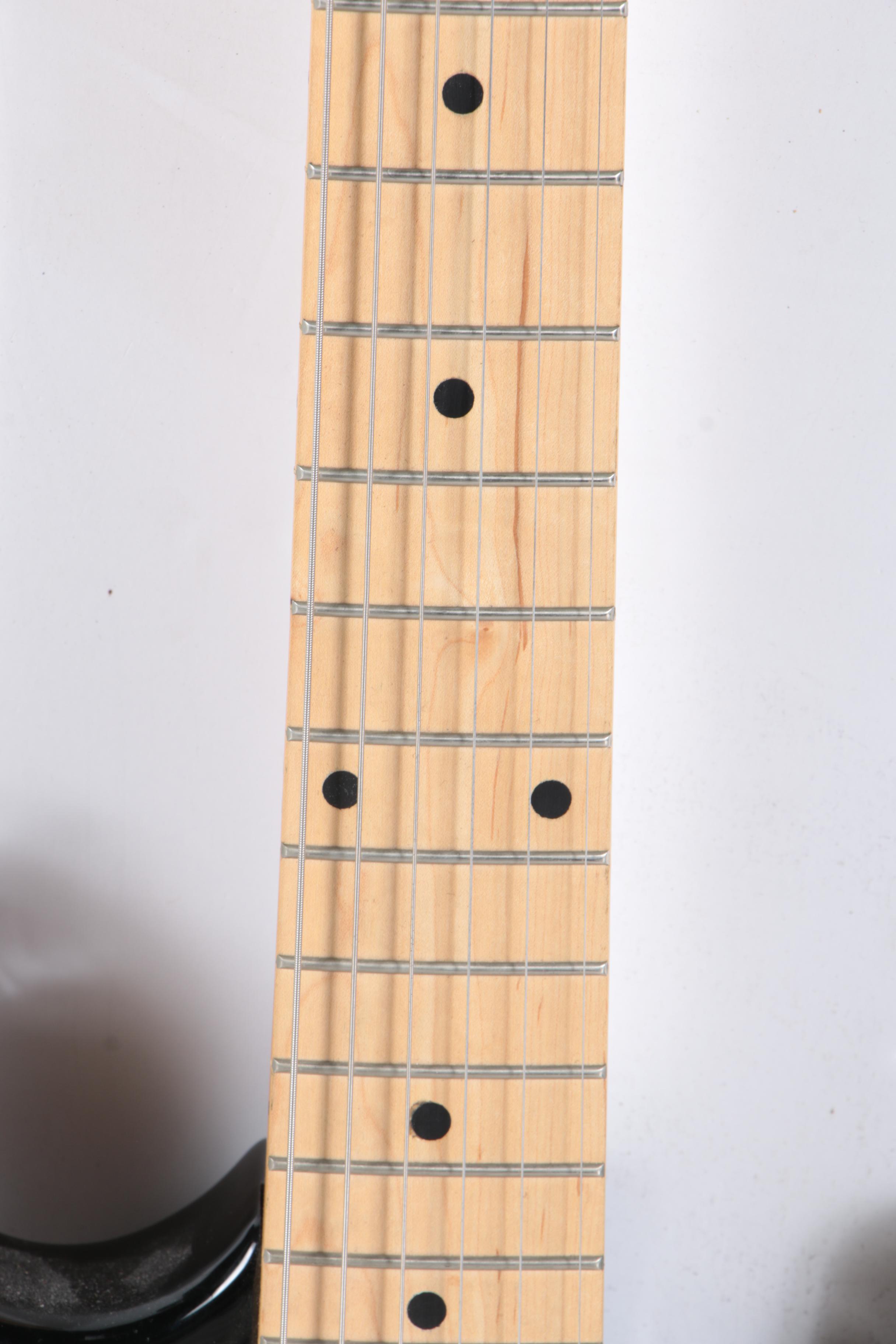 Behringer Strat Style Electric Guitar and Optimus Amplifier