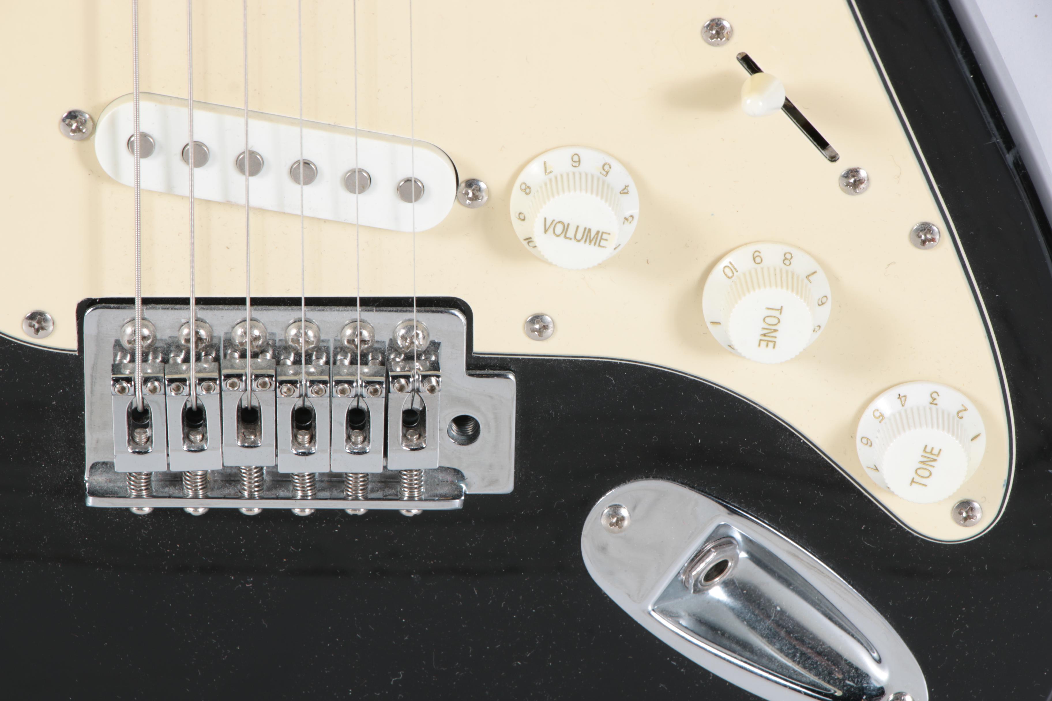 Behringer Strat Style Electric Guitar and Optimus Amplifier