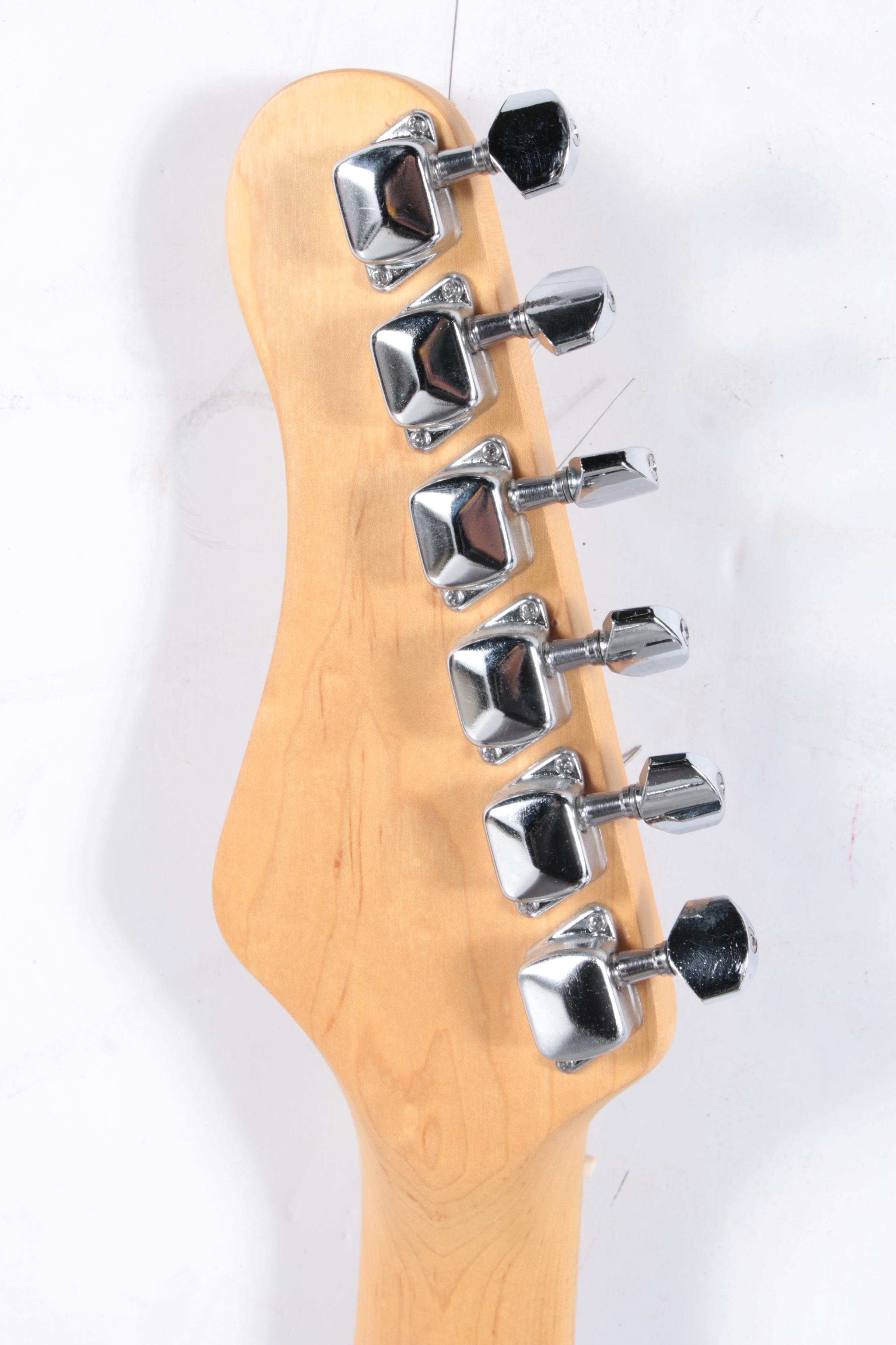 Behringer Strat Style Electric Guitar and Optimus Amplifier