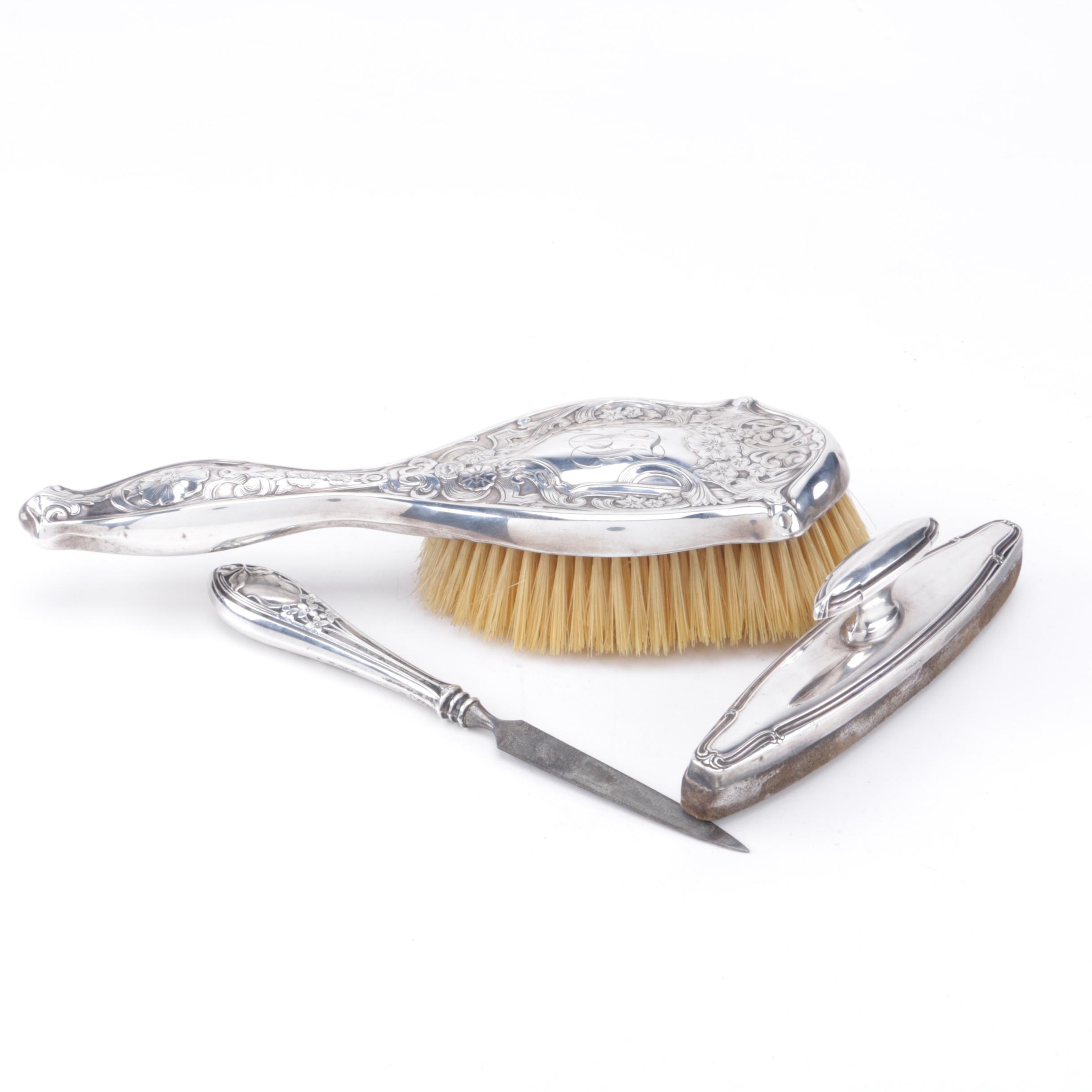 Sterling Handle Vanity Pieces Featuring Webster Company