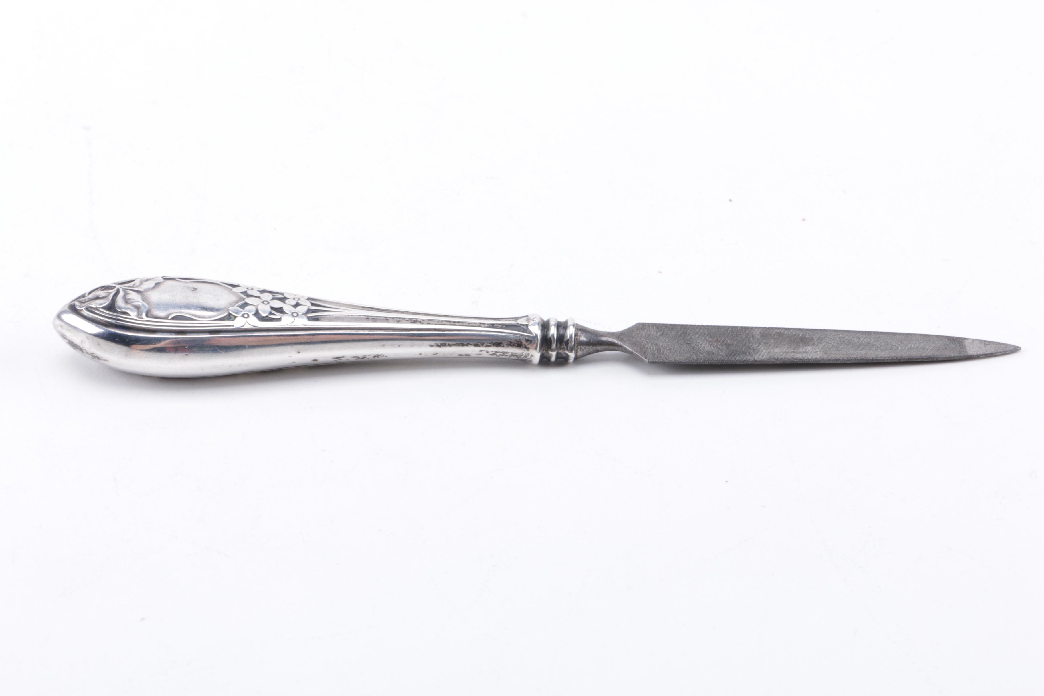 Sterling Handle Vanity Pieces Featuring Webster Company