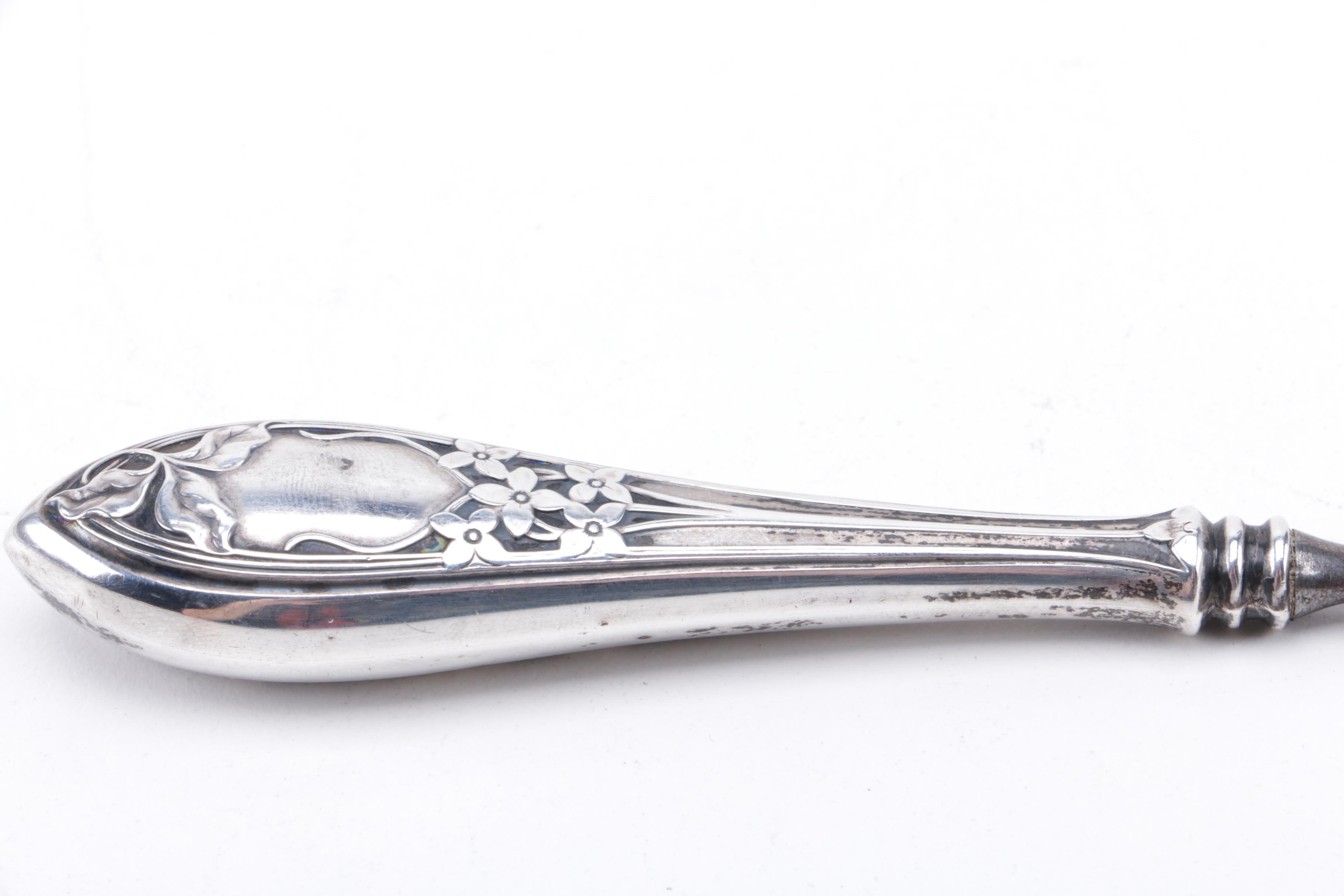 Sterling Handle Vanity Pieces Featuring Webster Company