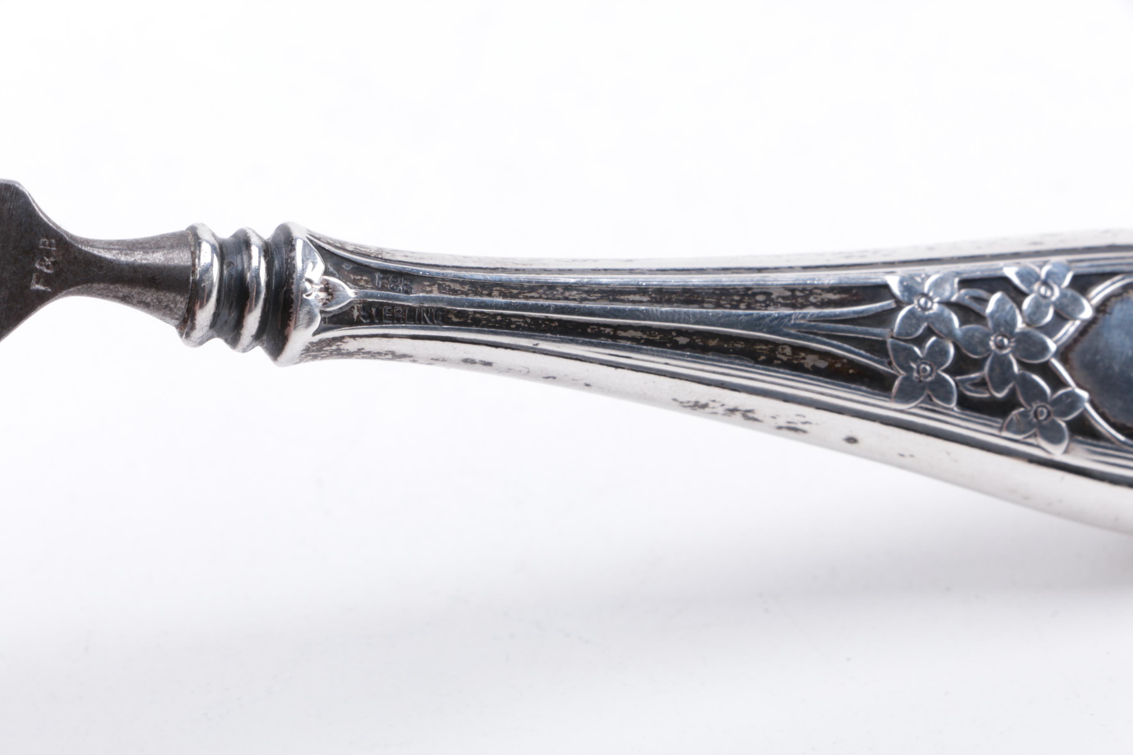 Sterling Handle Vanity Pieces Featuring Webster Company