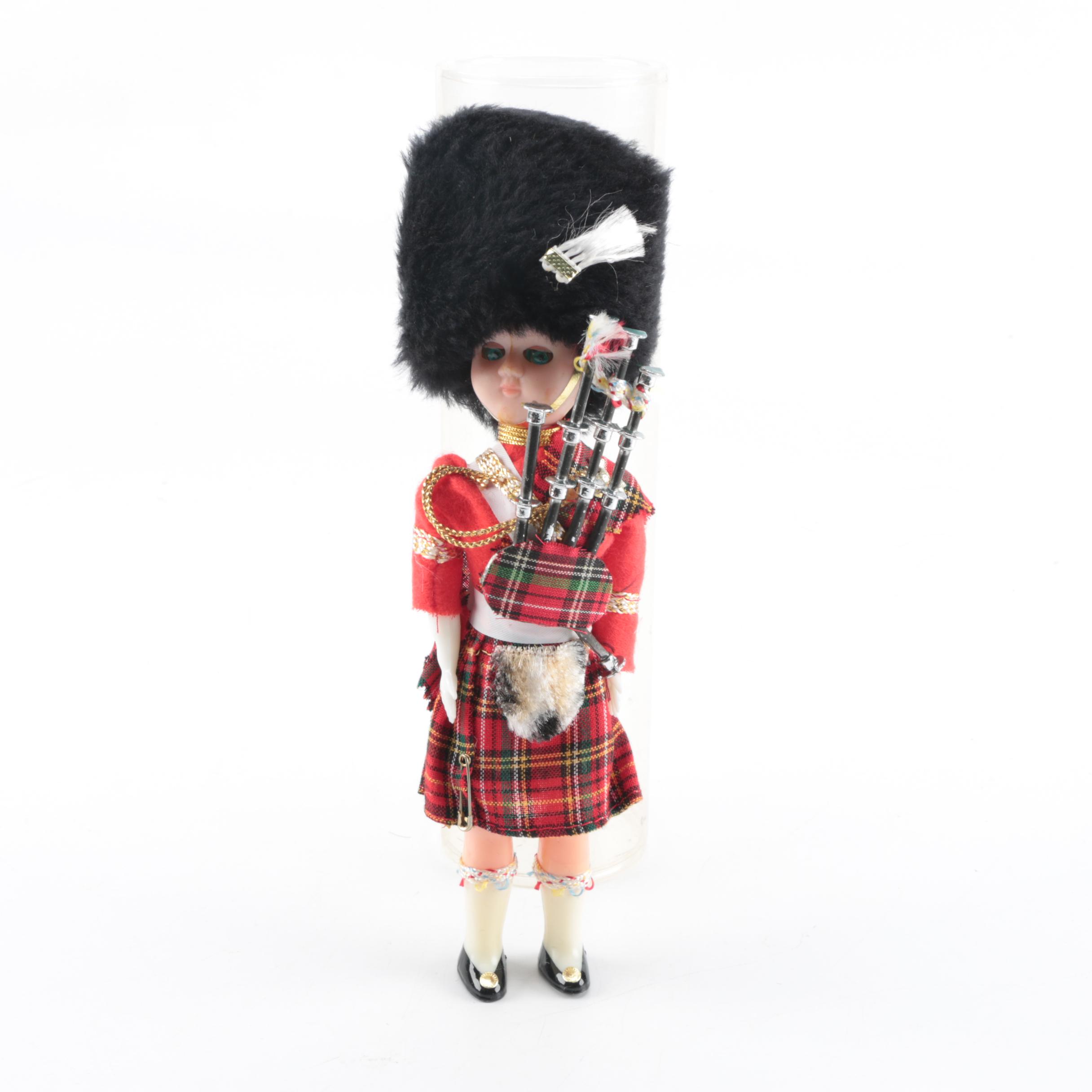 Plastic Bagpipe Player Doll