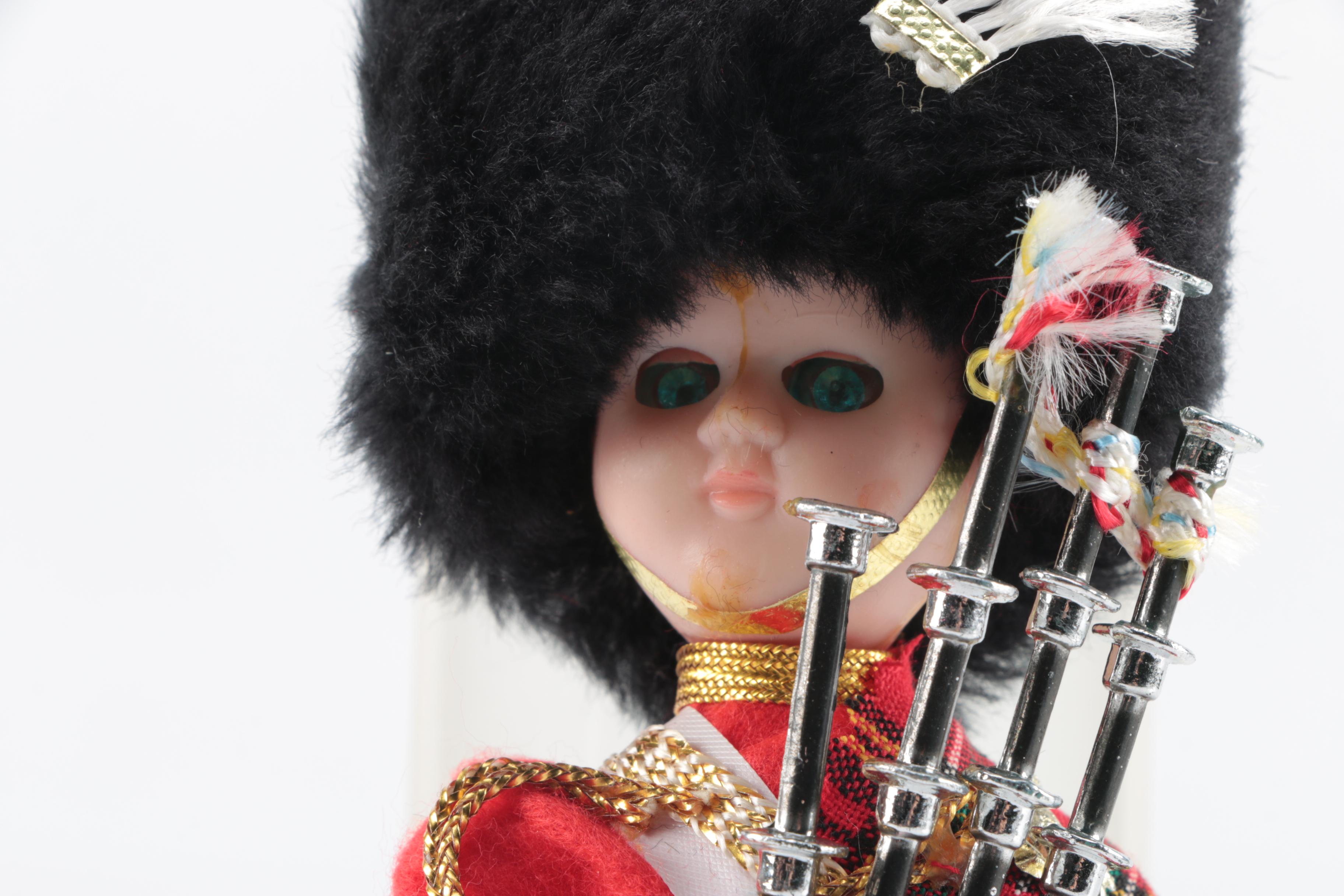 Plastic Bagpipe Player Doll