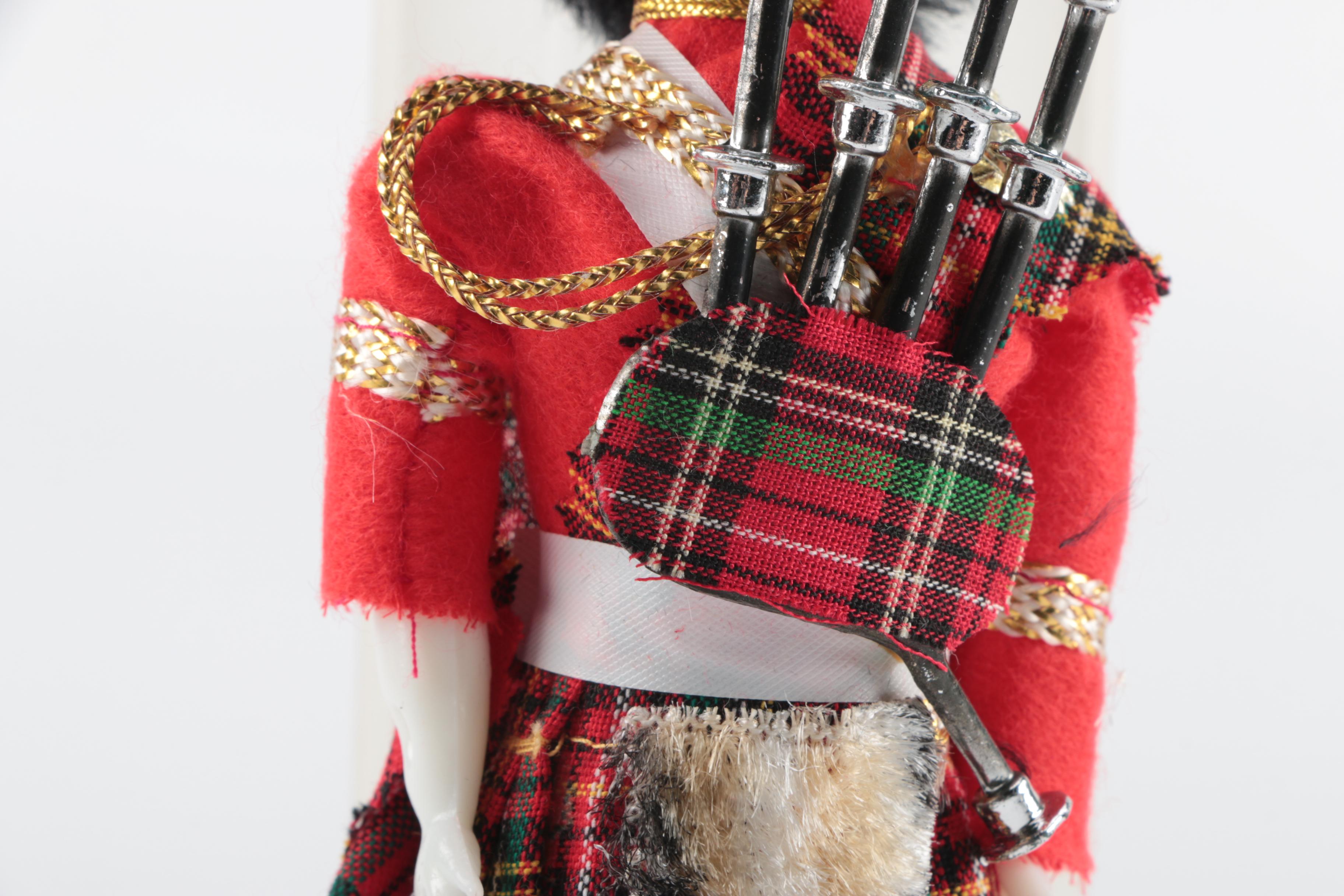 Plastic Bagpipe Player Doll