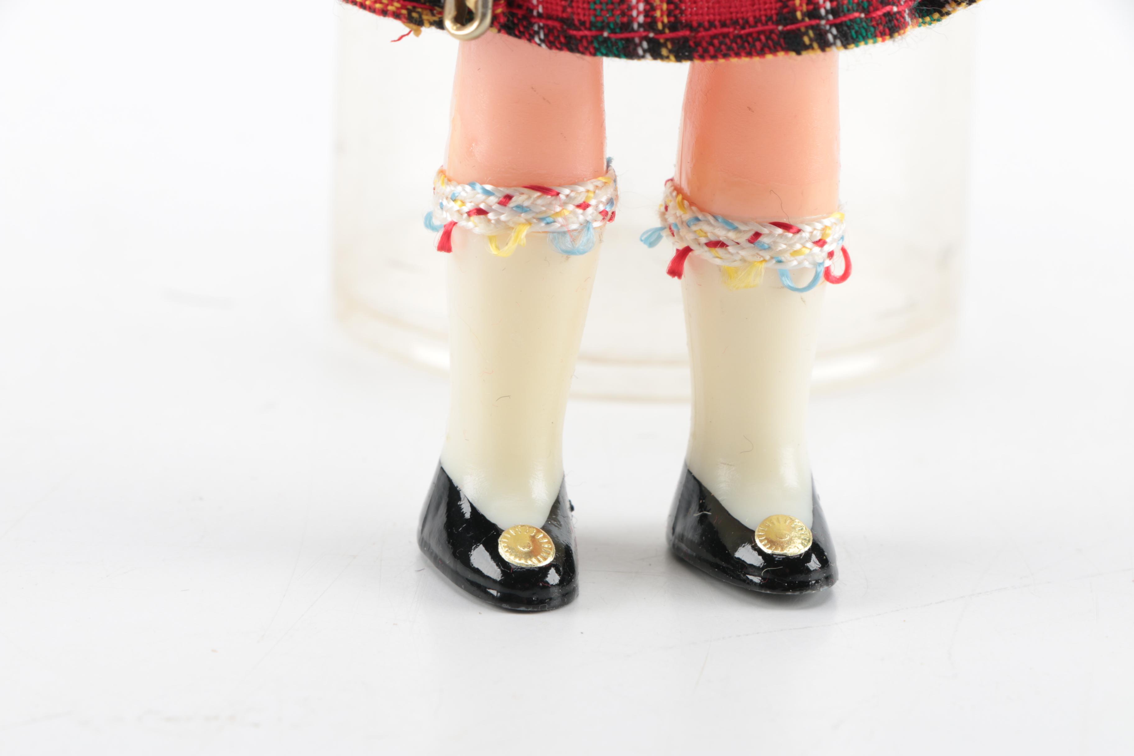 Plastic Bagpipe Player Doll