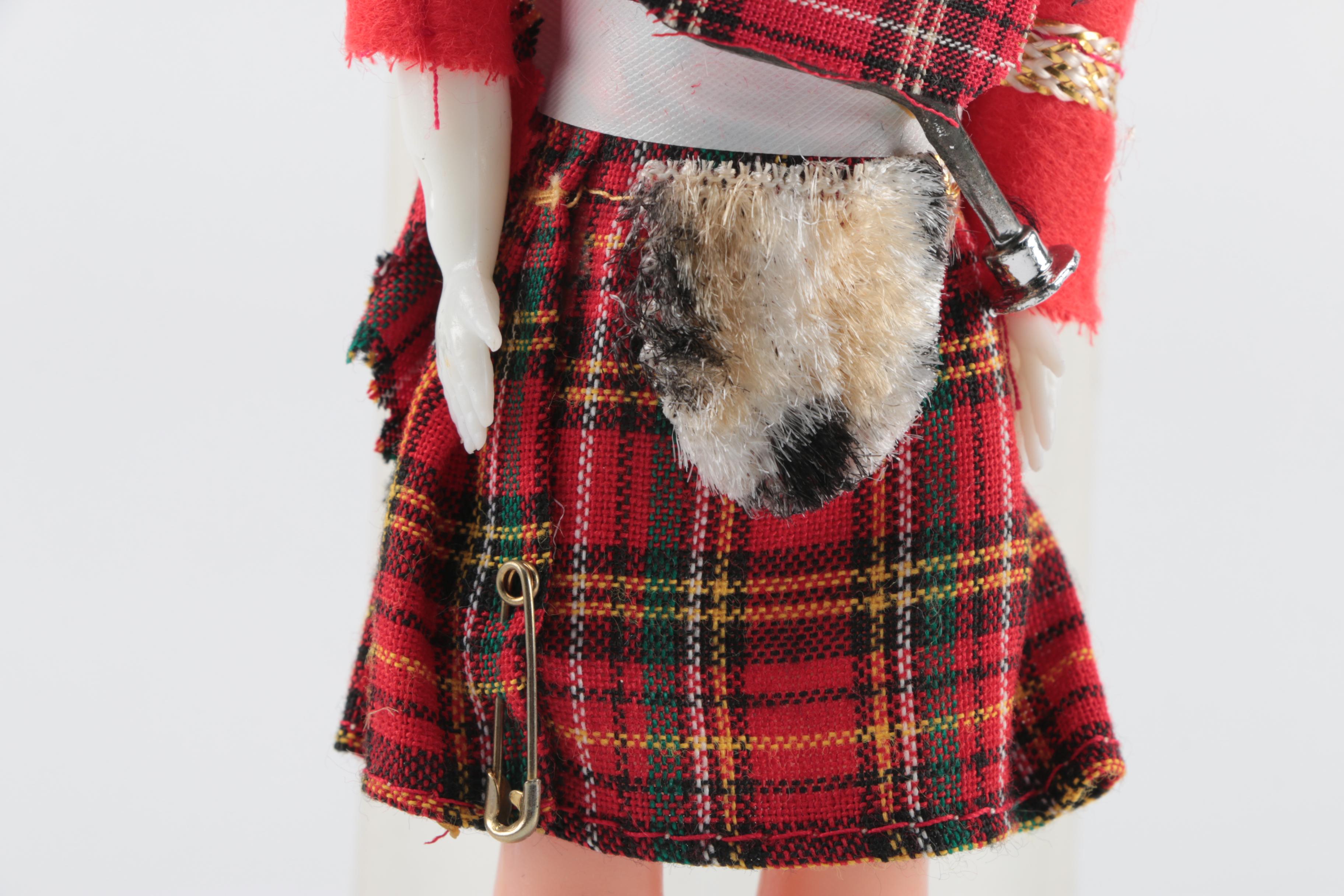 Plastic Bagpipe Player Doll