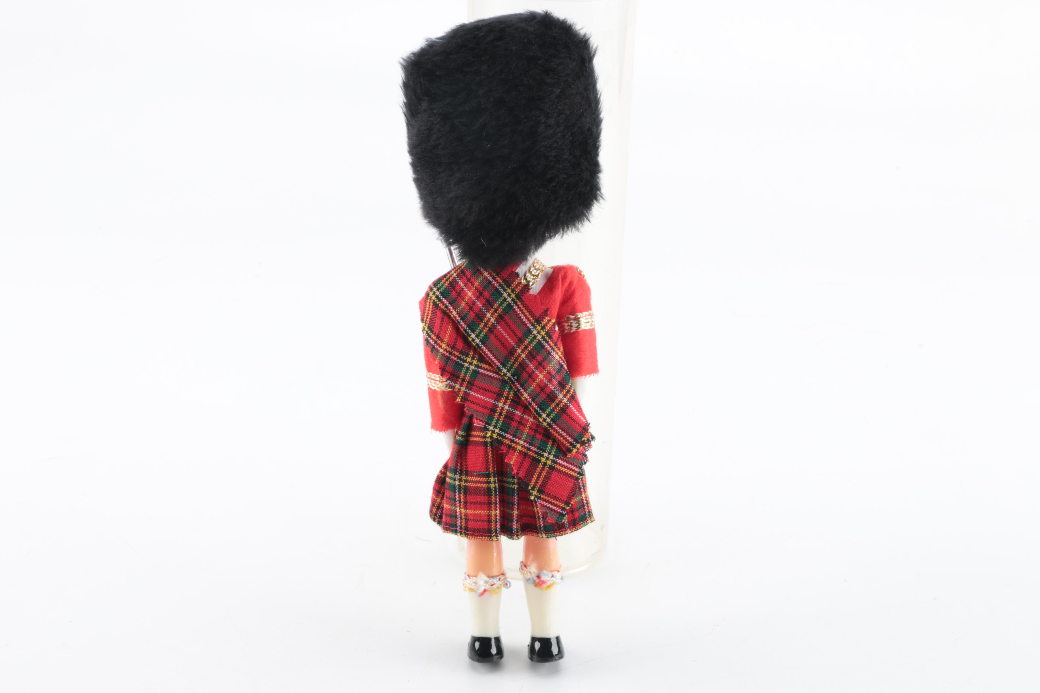 Plastic Bagpipe Player Doll