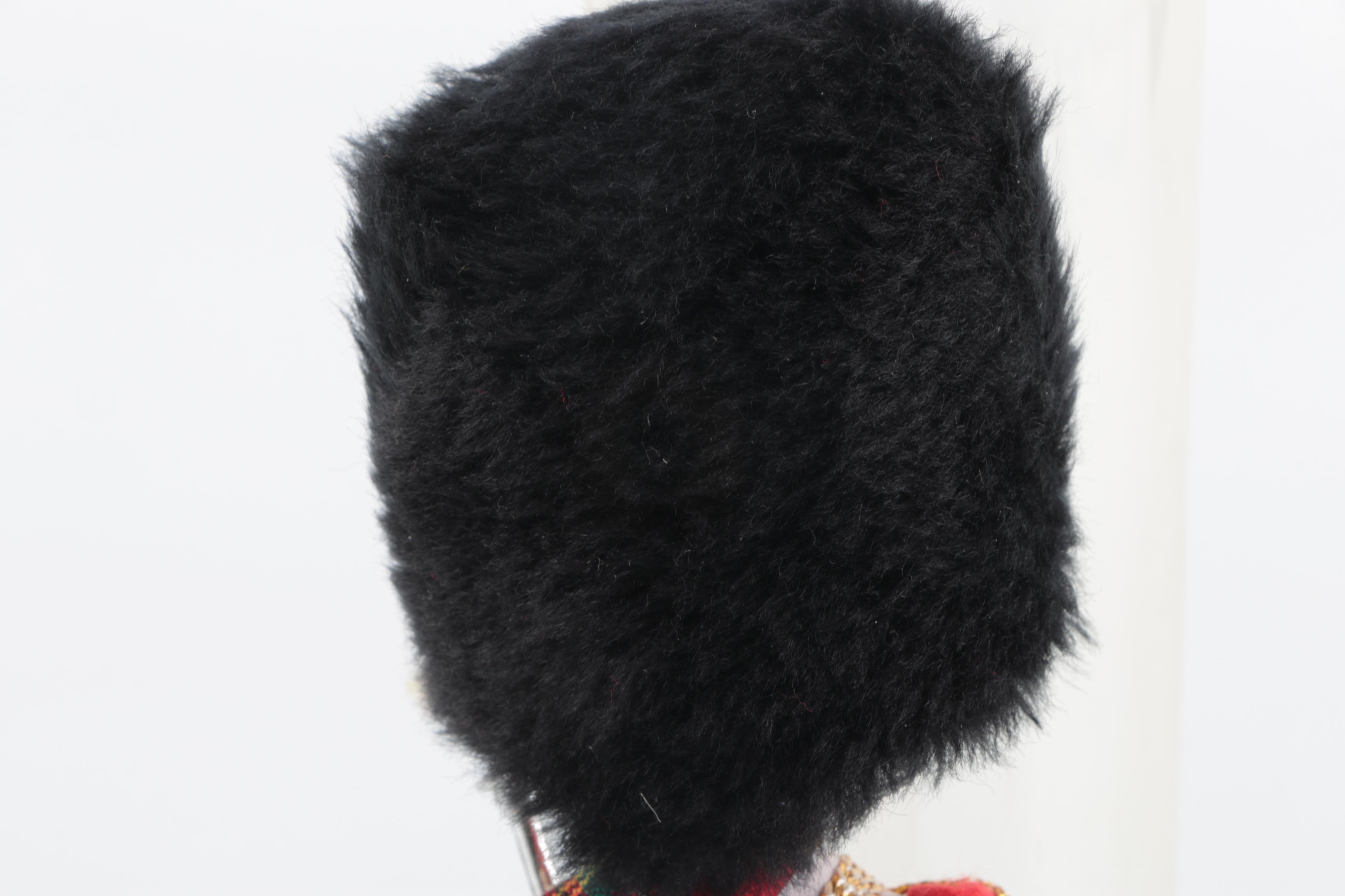 Plastic Bagpipe Player Doll