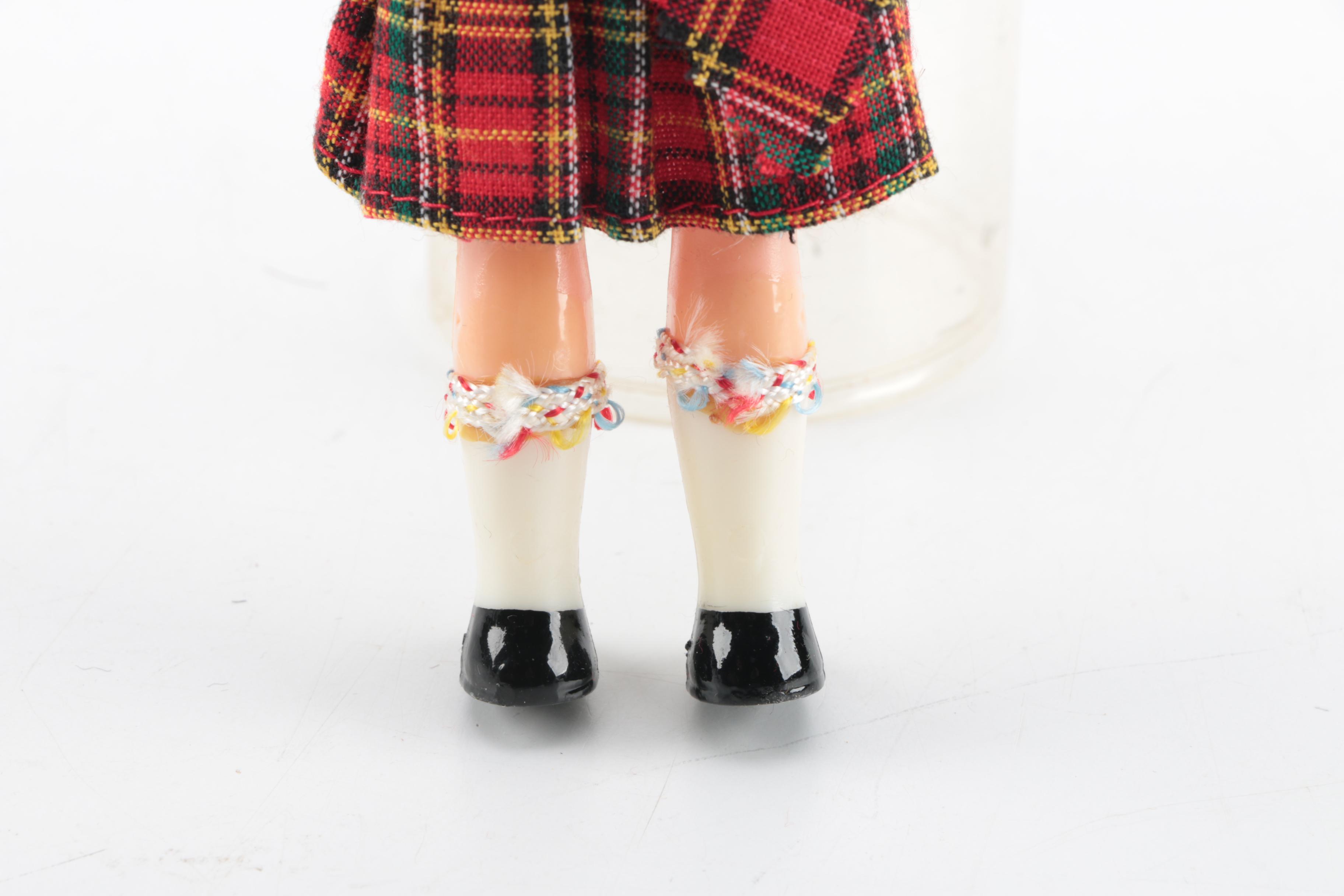 Plastic Bagpipe Player Doll