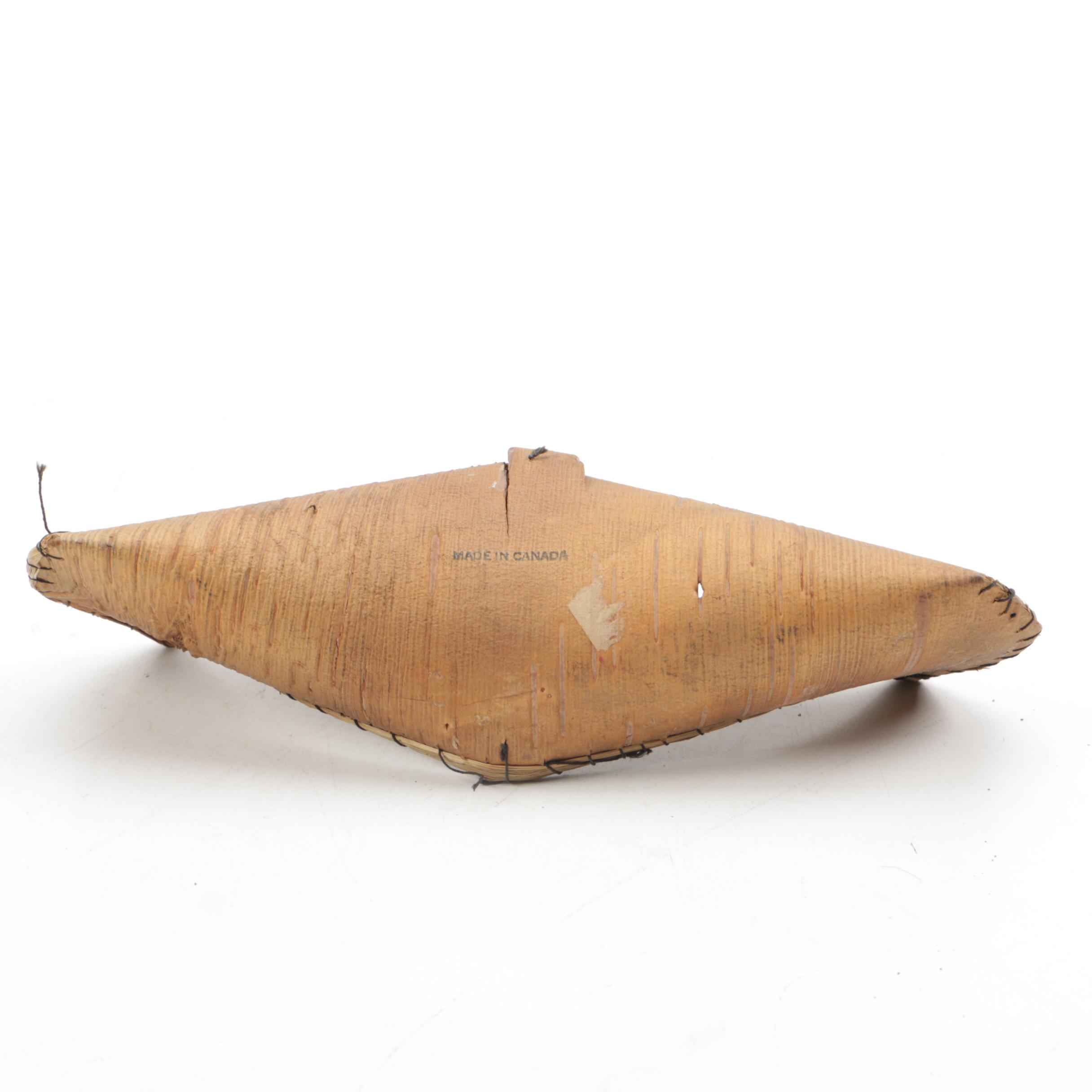 Carved Wooden Canoes