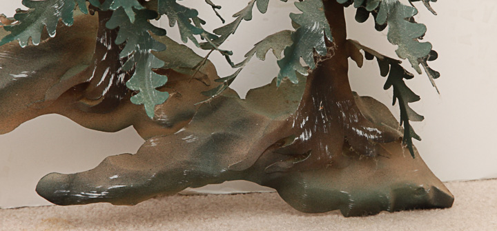 Metal Sculpture of a Woodland Scene with Snowy Mountains