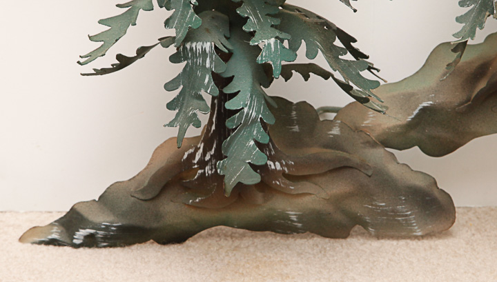 Metal Sculpture of a Woodland Scene with Snowy Mountains