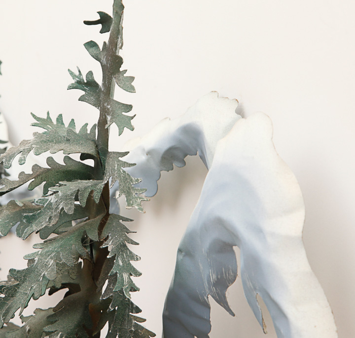 Metal Sculpture of a Woodland Scene with Snowy Mountains