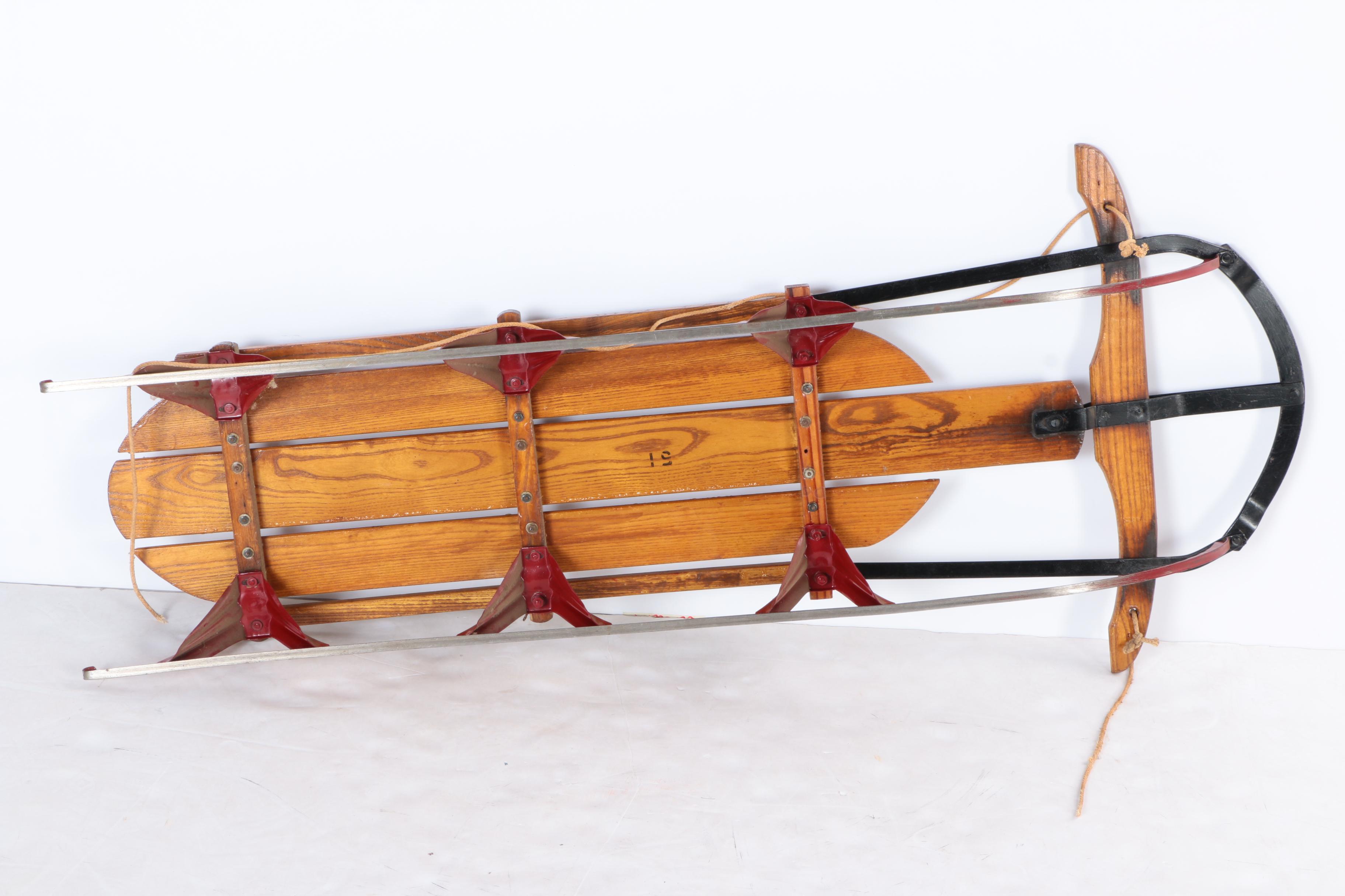 Three Vintage Wood and Metal Sleds