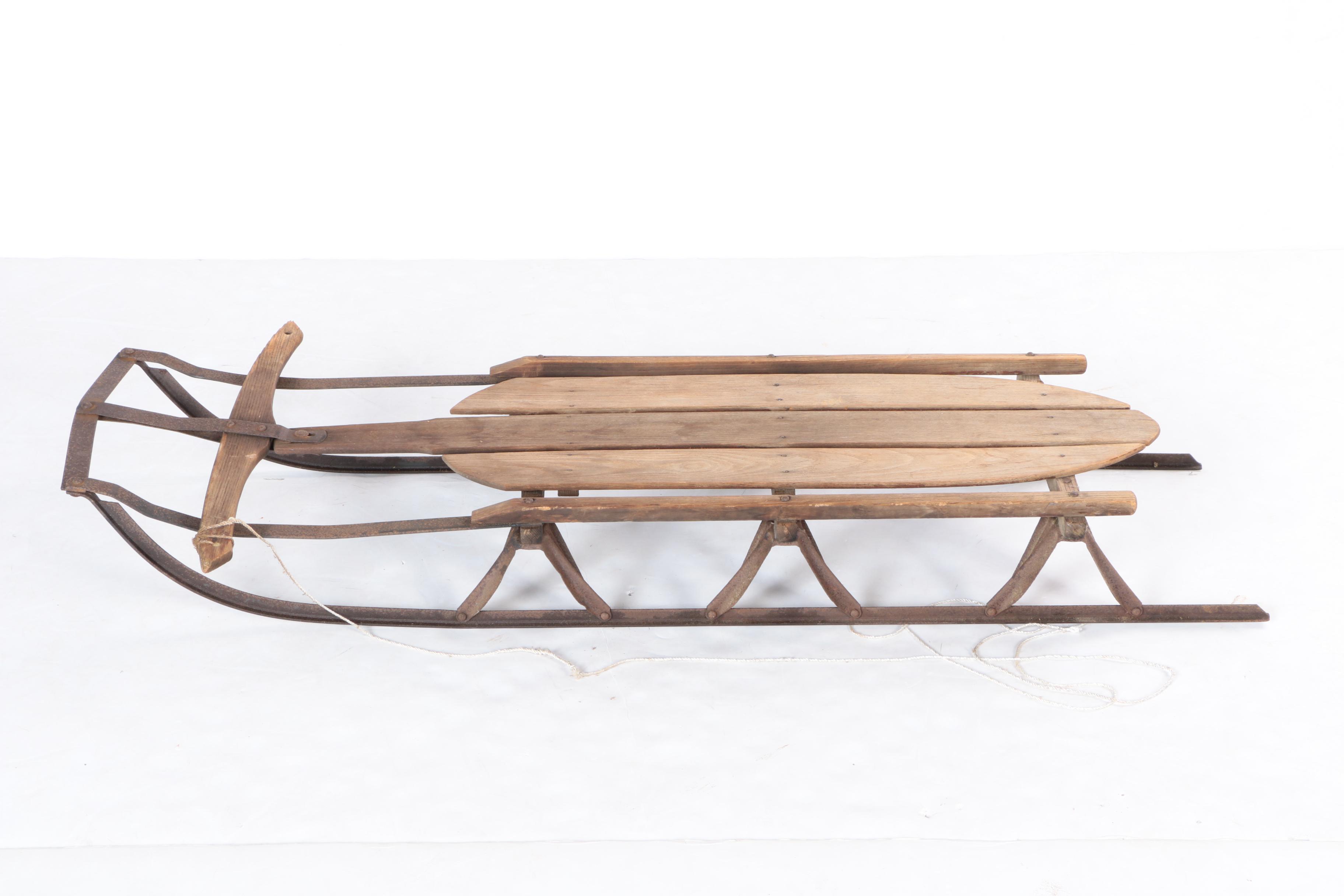 Three Vintage Wood and Metal Sleds