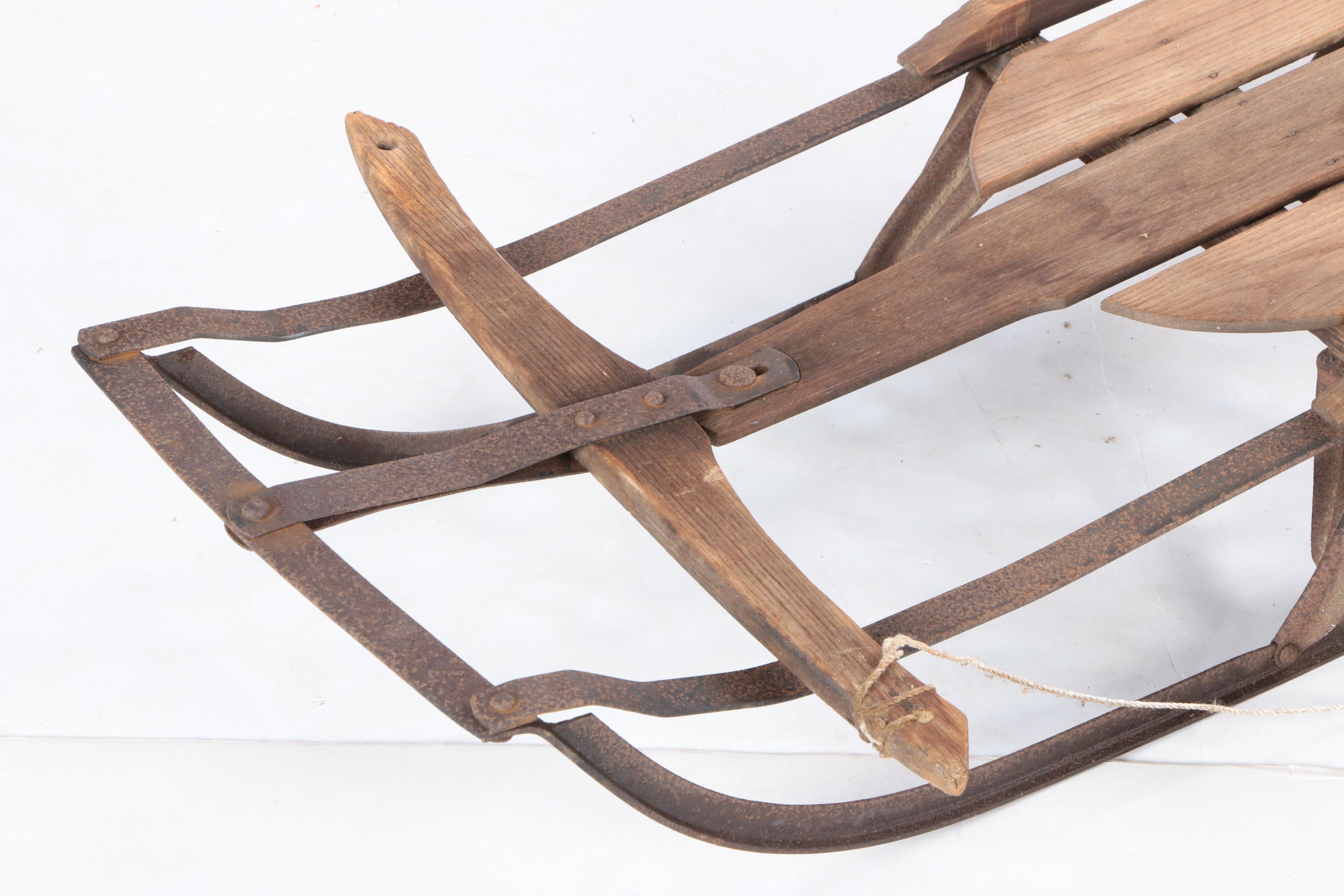 Three Vintage Wood and Metal Sleds