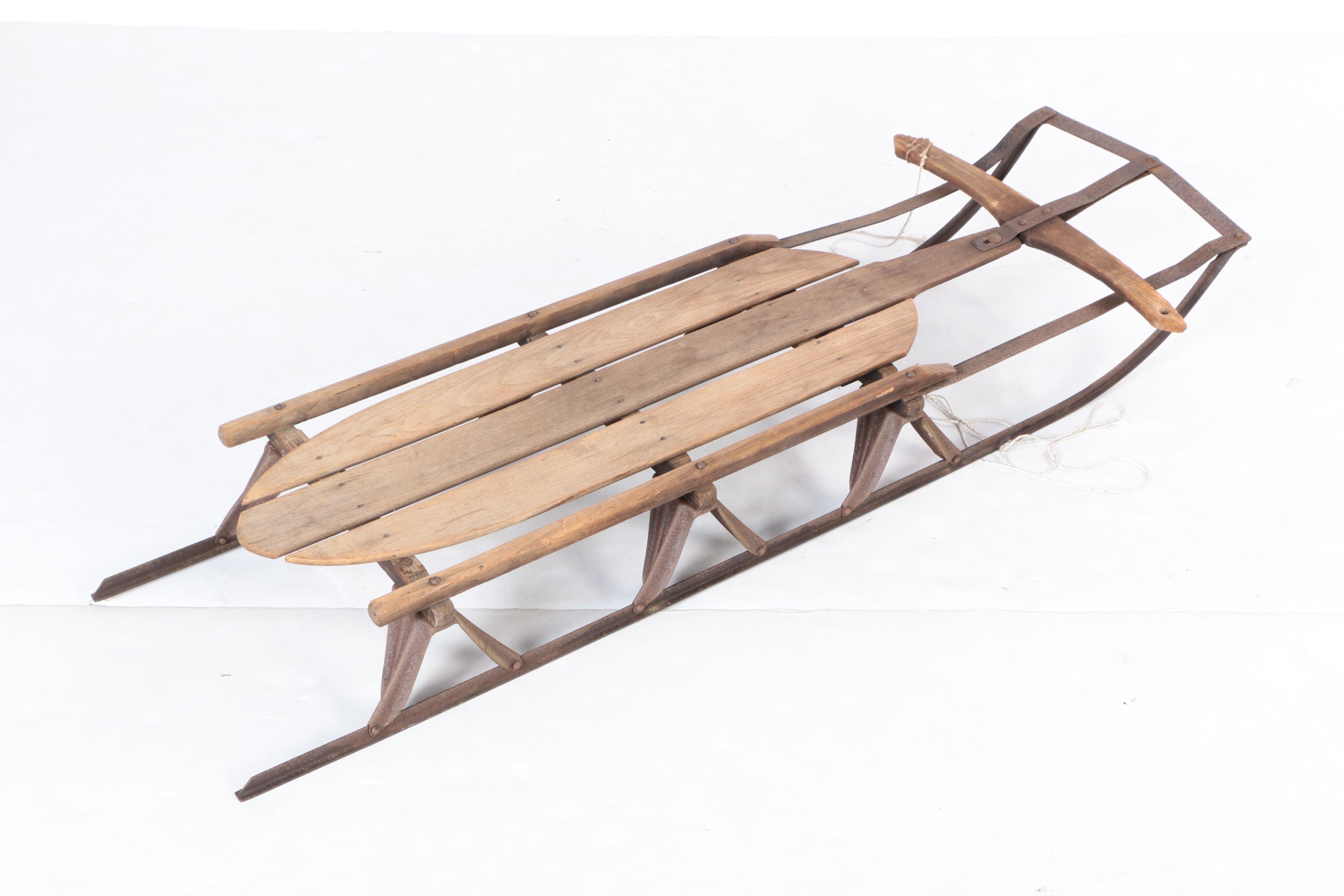 Three Vintage Wood and Metal Sleds