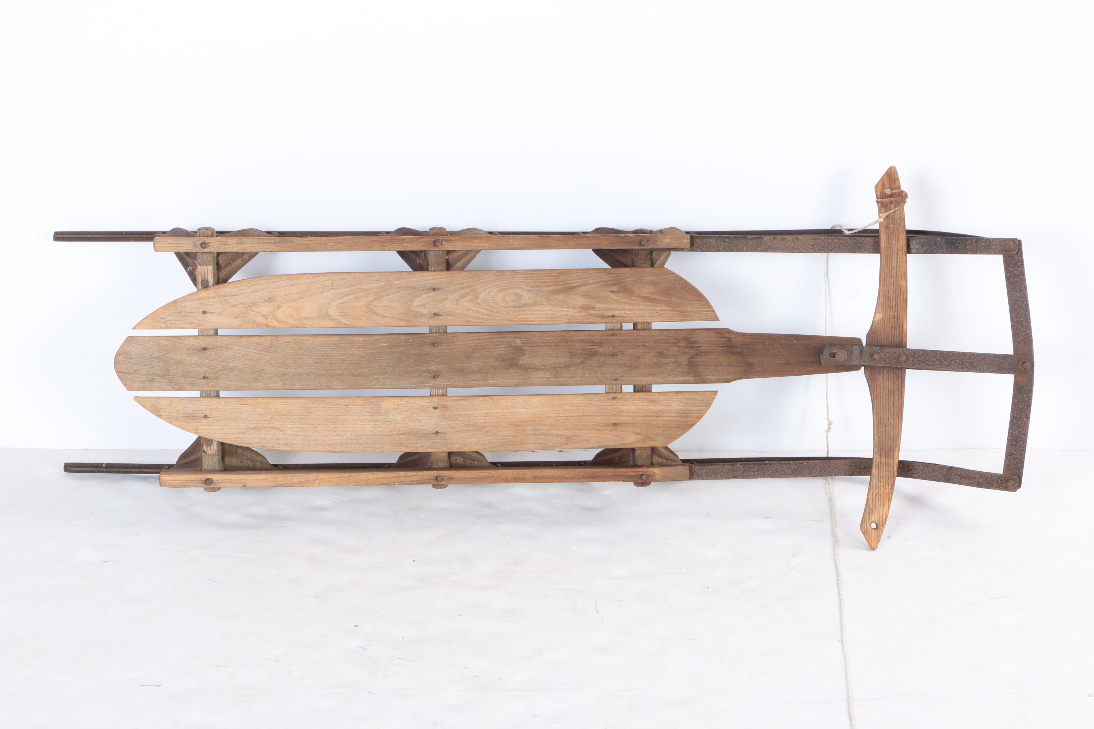 Three Vintage Wood and Metal Sleds
