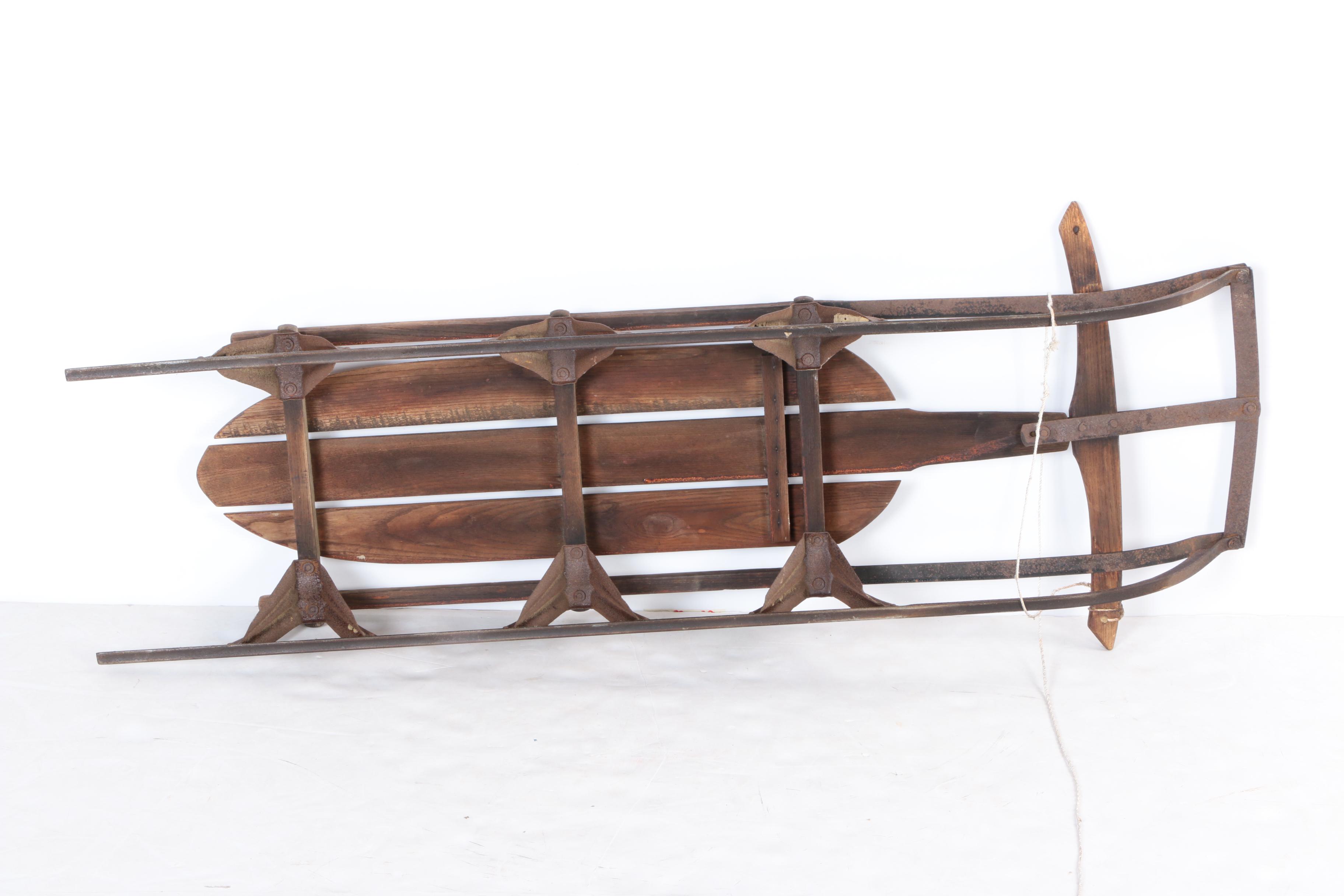 Three Vintage Wood and Metal Sleds