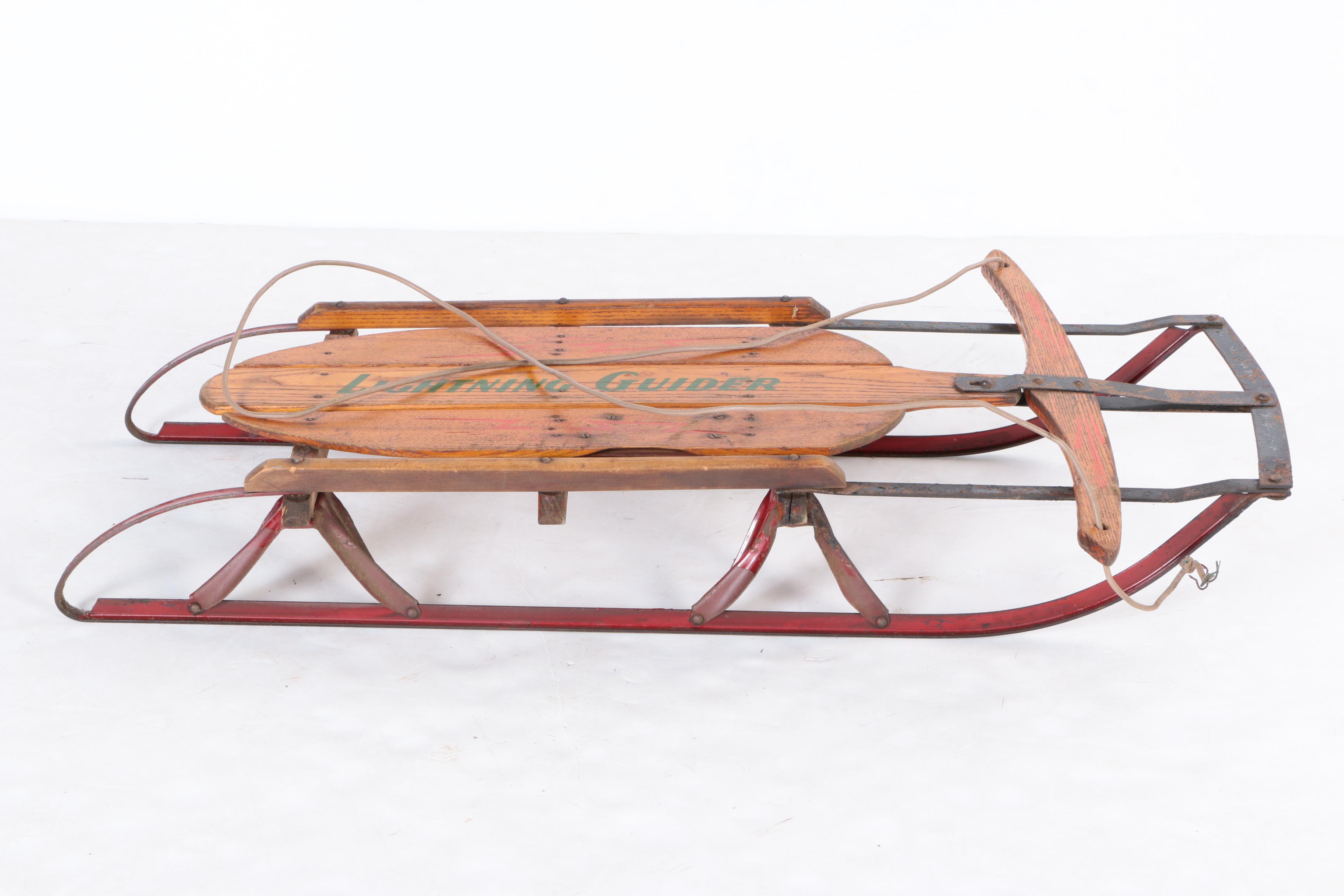 Three Vintage Wood and Metal Sleds