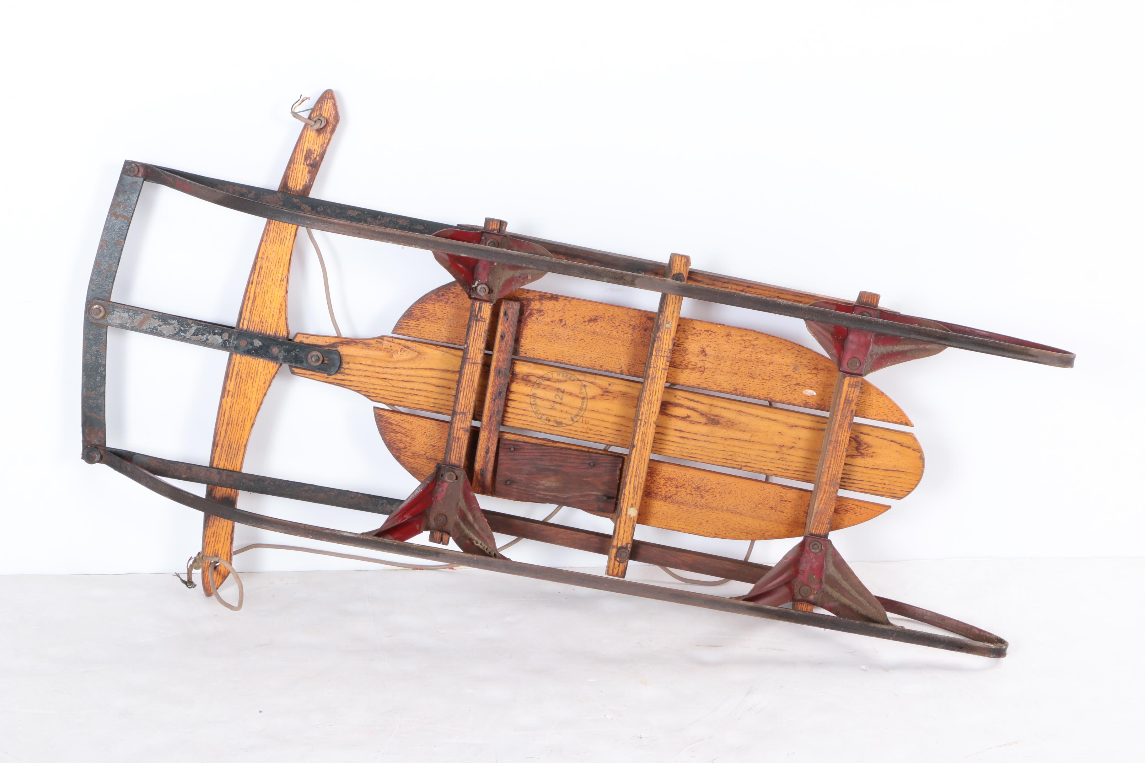 Three Vintage Wood and Metal Sleds