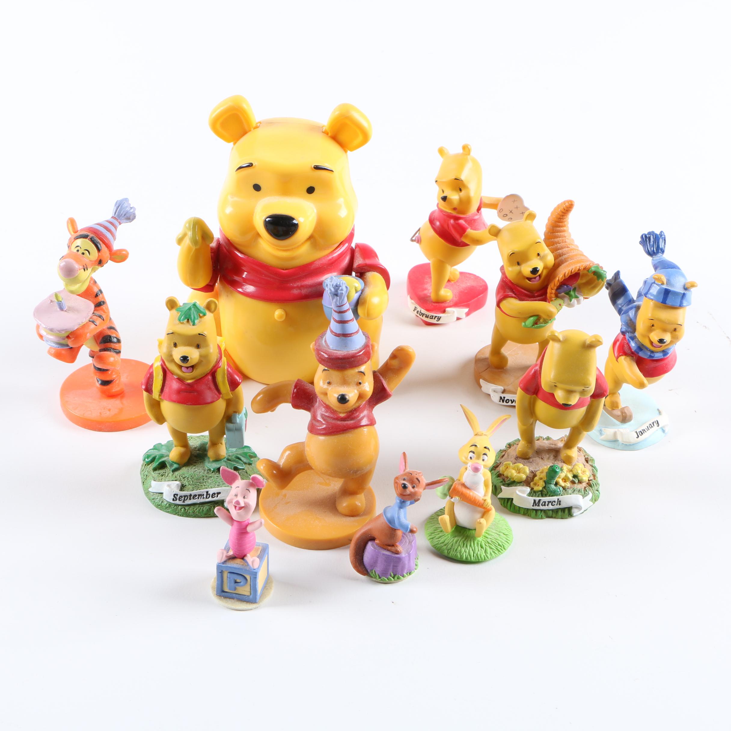 Collection of Winnie the Pooh Figurines