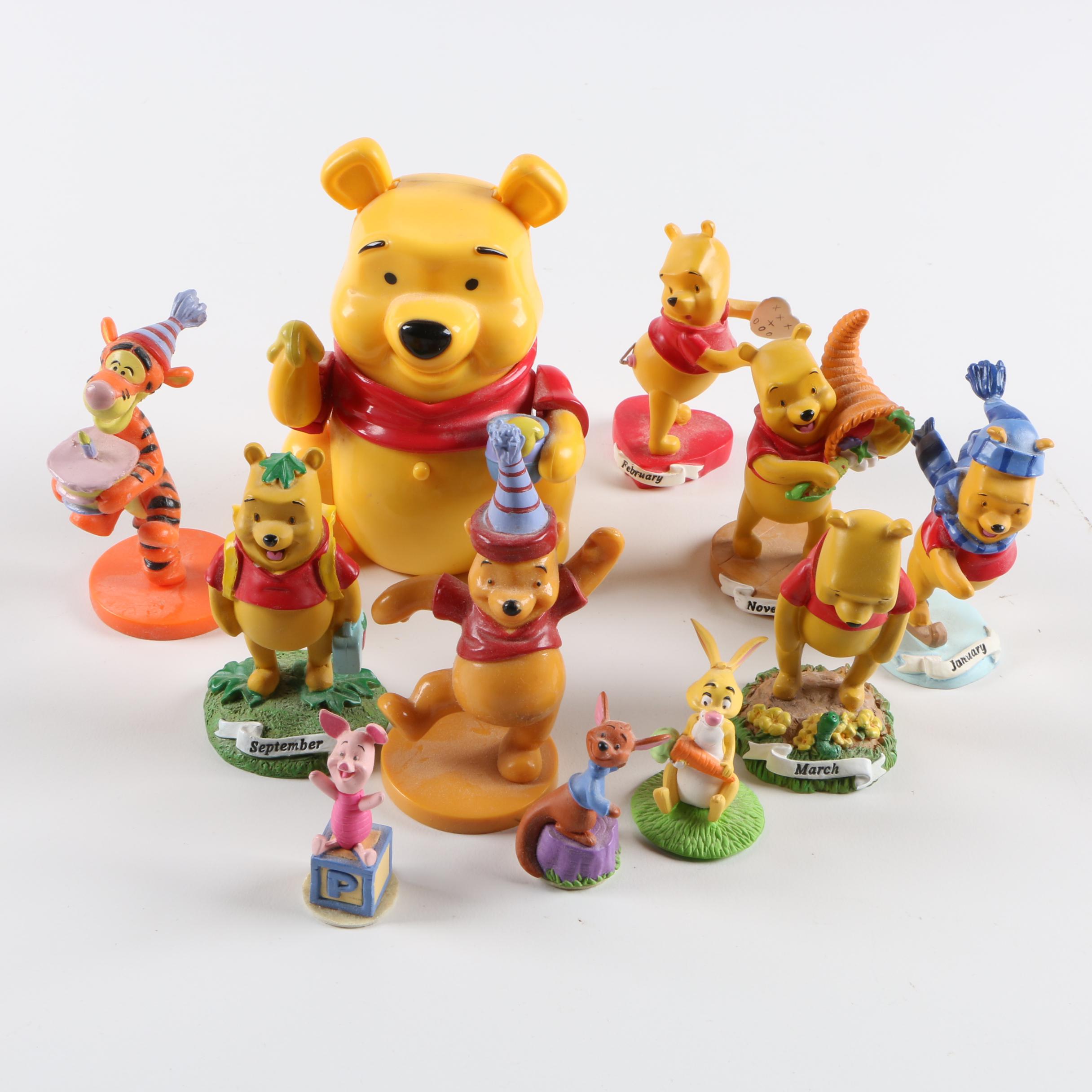 Collection of Winnie the Pooh Figurines