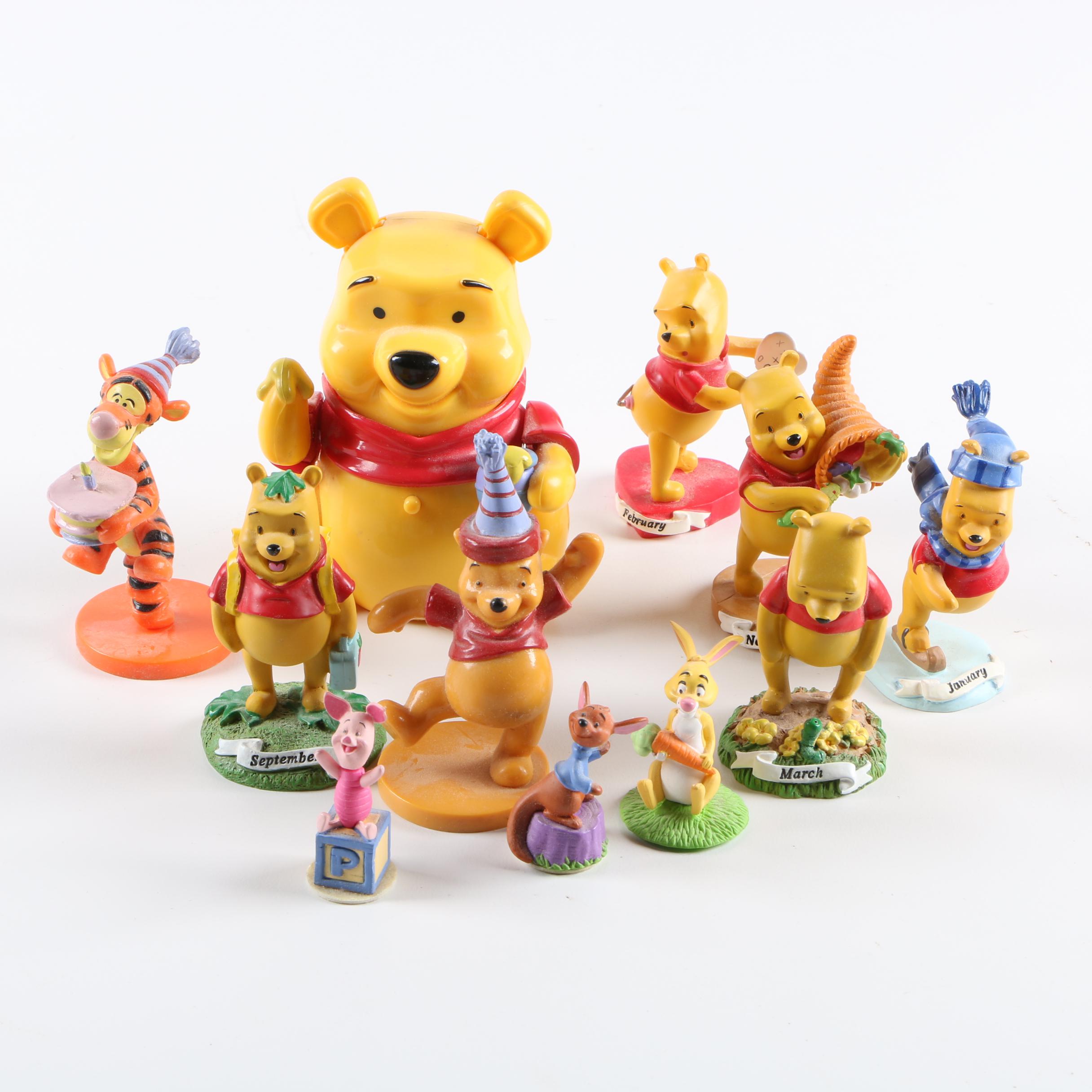 Collection of Winnie the Pooh Figurines
