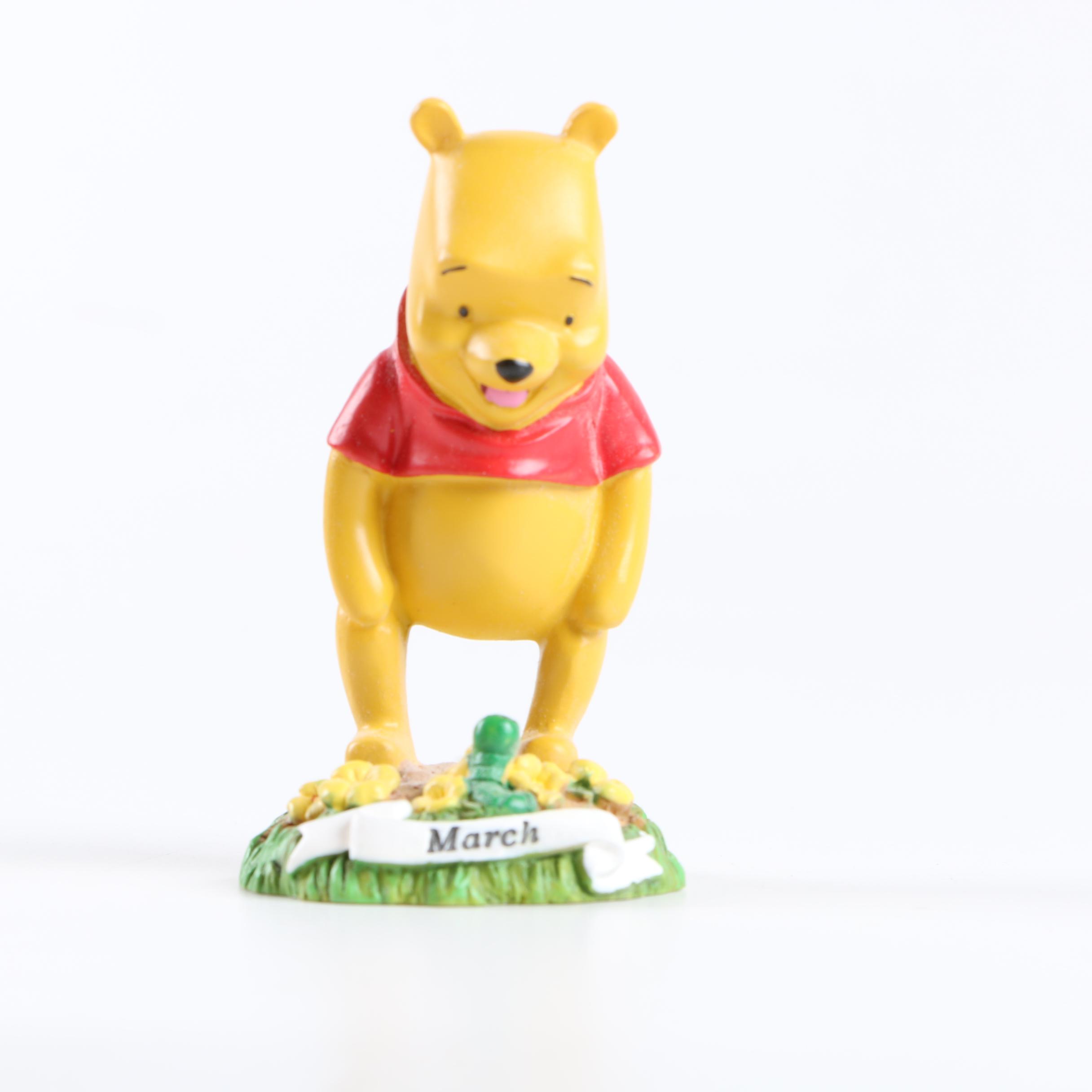 Collection of Winnie the Pooh Figurines