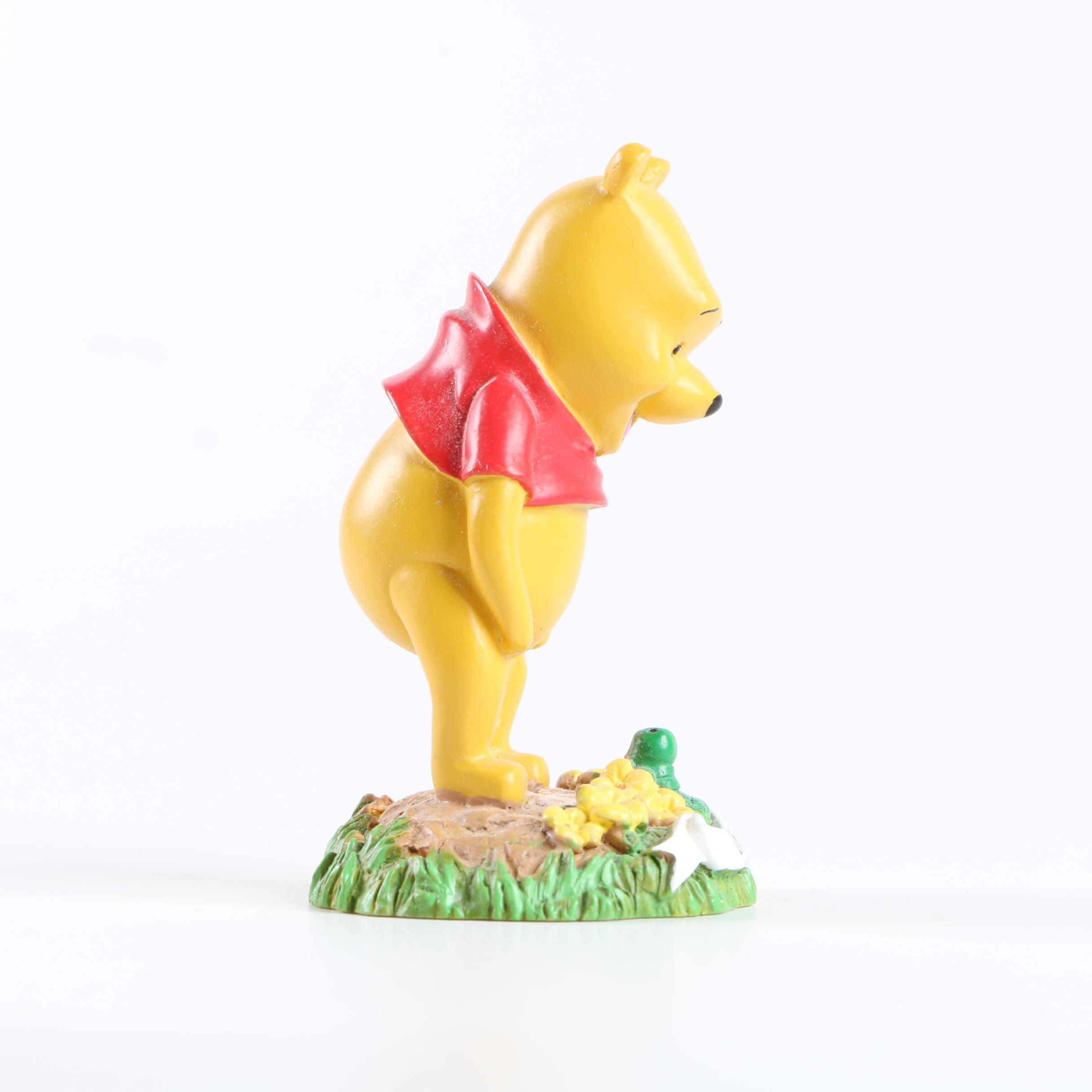 Collection of Winnie the Pooh Figurines