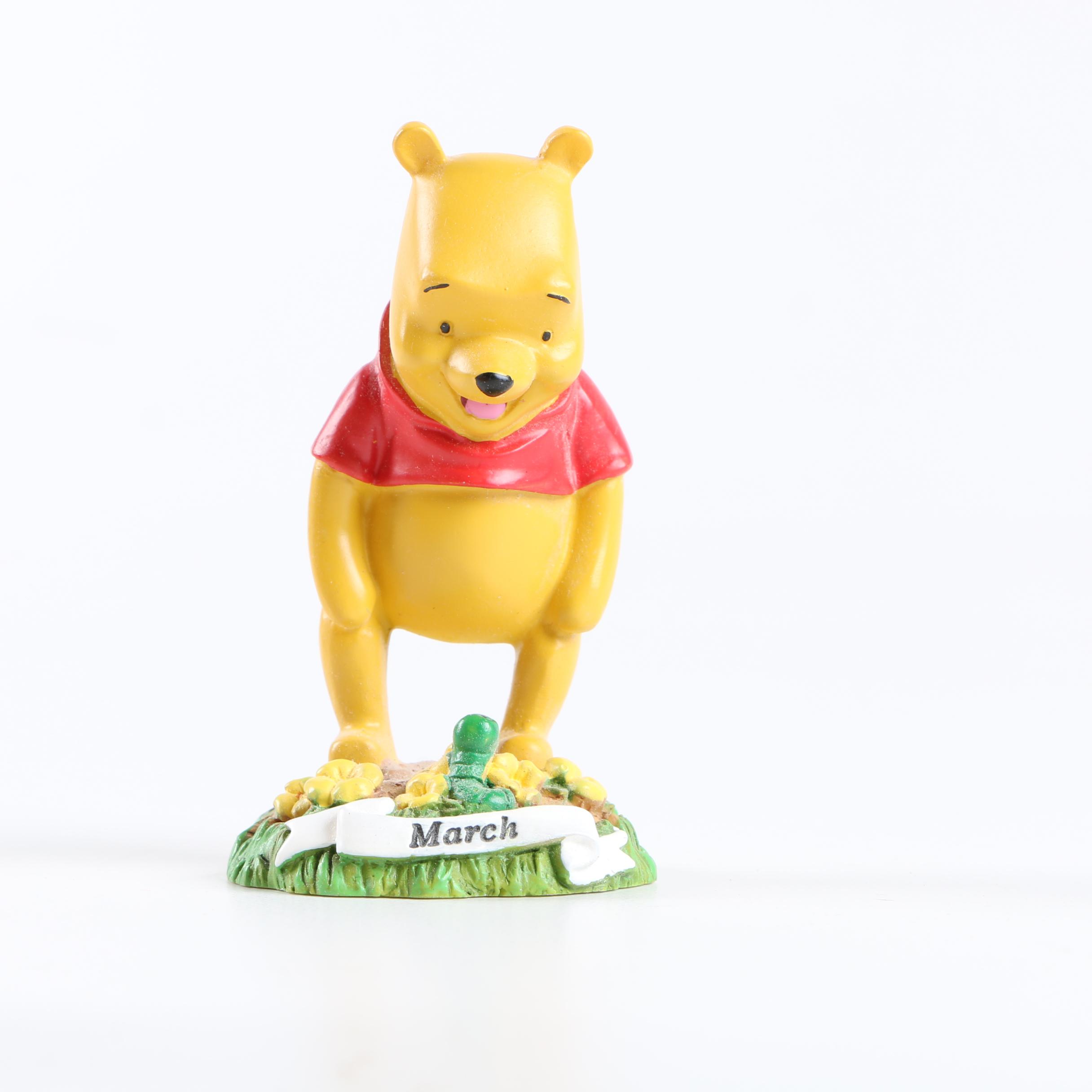 Collection of Winnie the Pooh Figurines