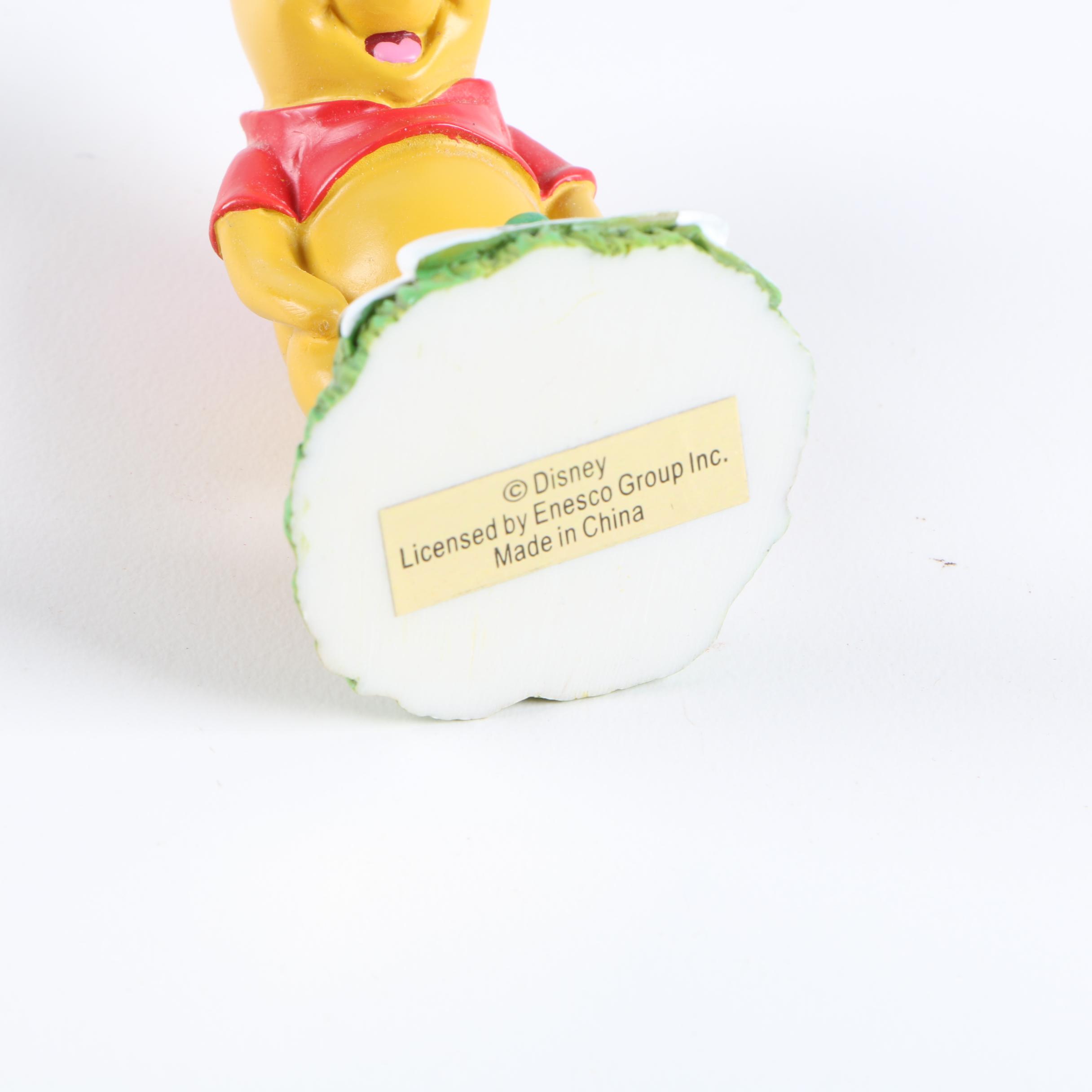 Collection of Winnie the Pooh Figurines