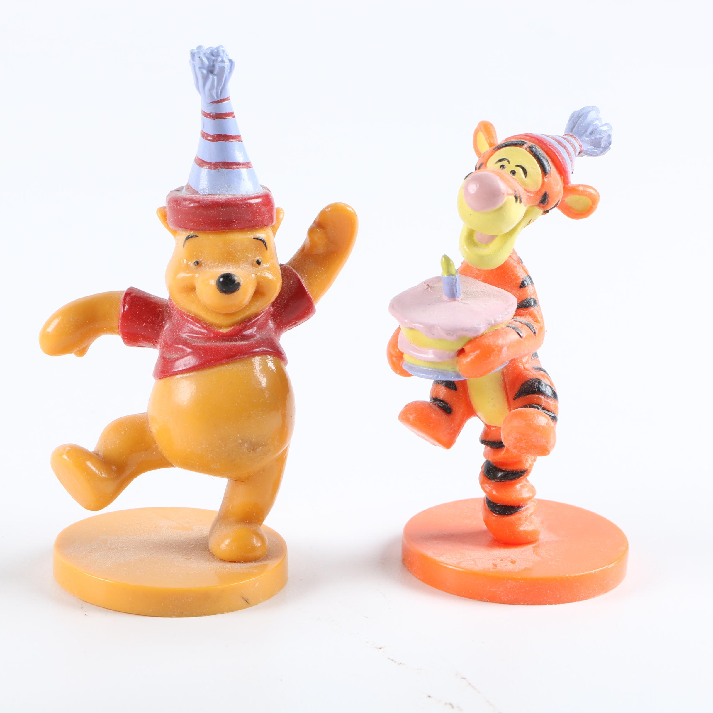 Collection of Winnie the Pooh Figurines